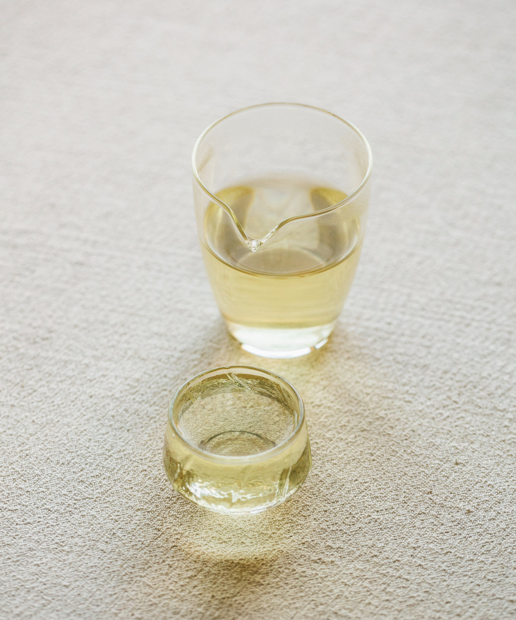 Jasmine Jade Tips brewed in cup — Master Bai's hot-scented jasmine, intense and milky