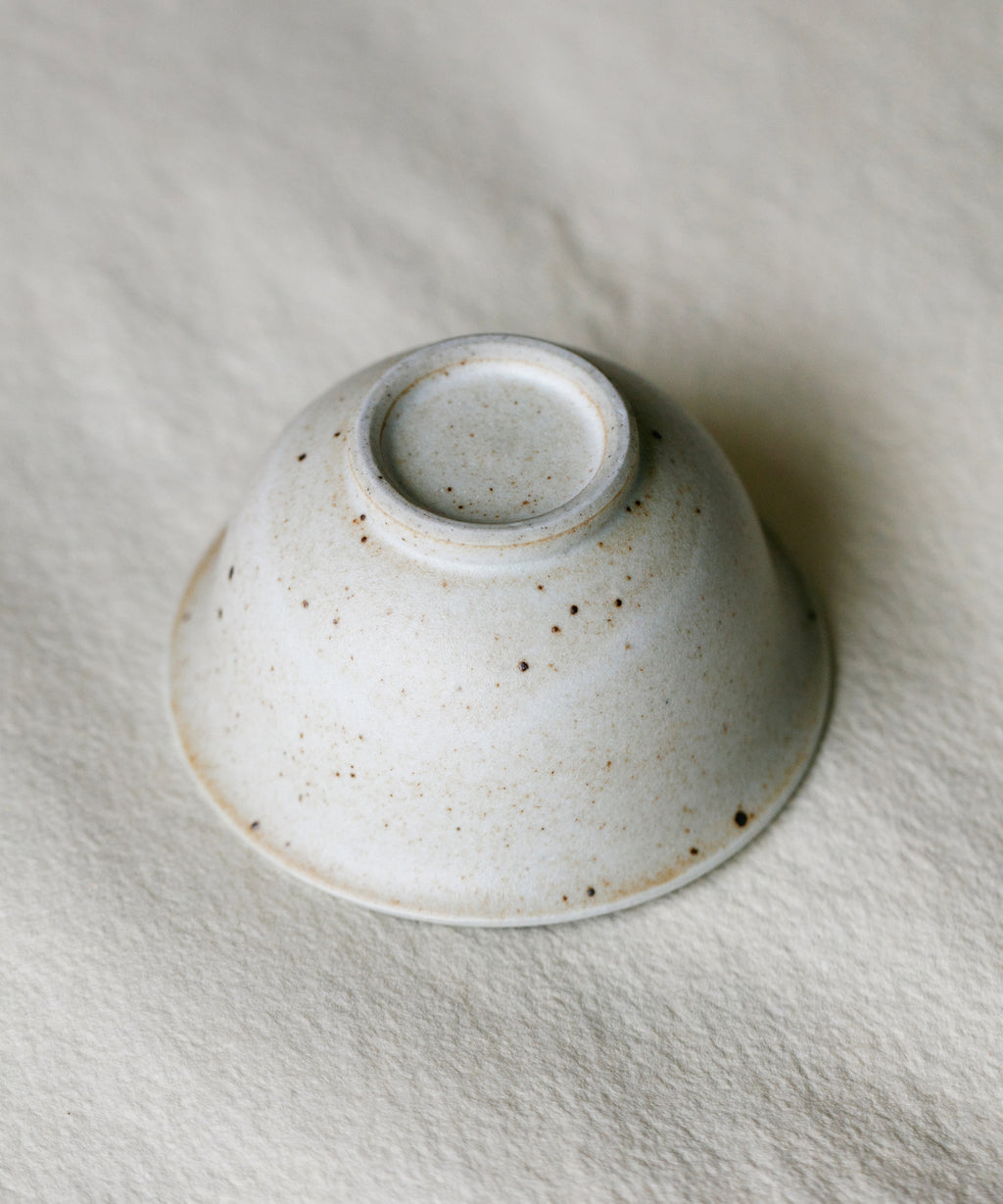 Matte Sunrise Cup underside, unglazed foot ring, Jingdezhen clay body, Wang Xinghua