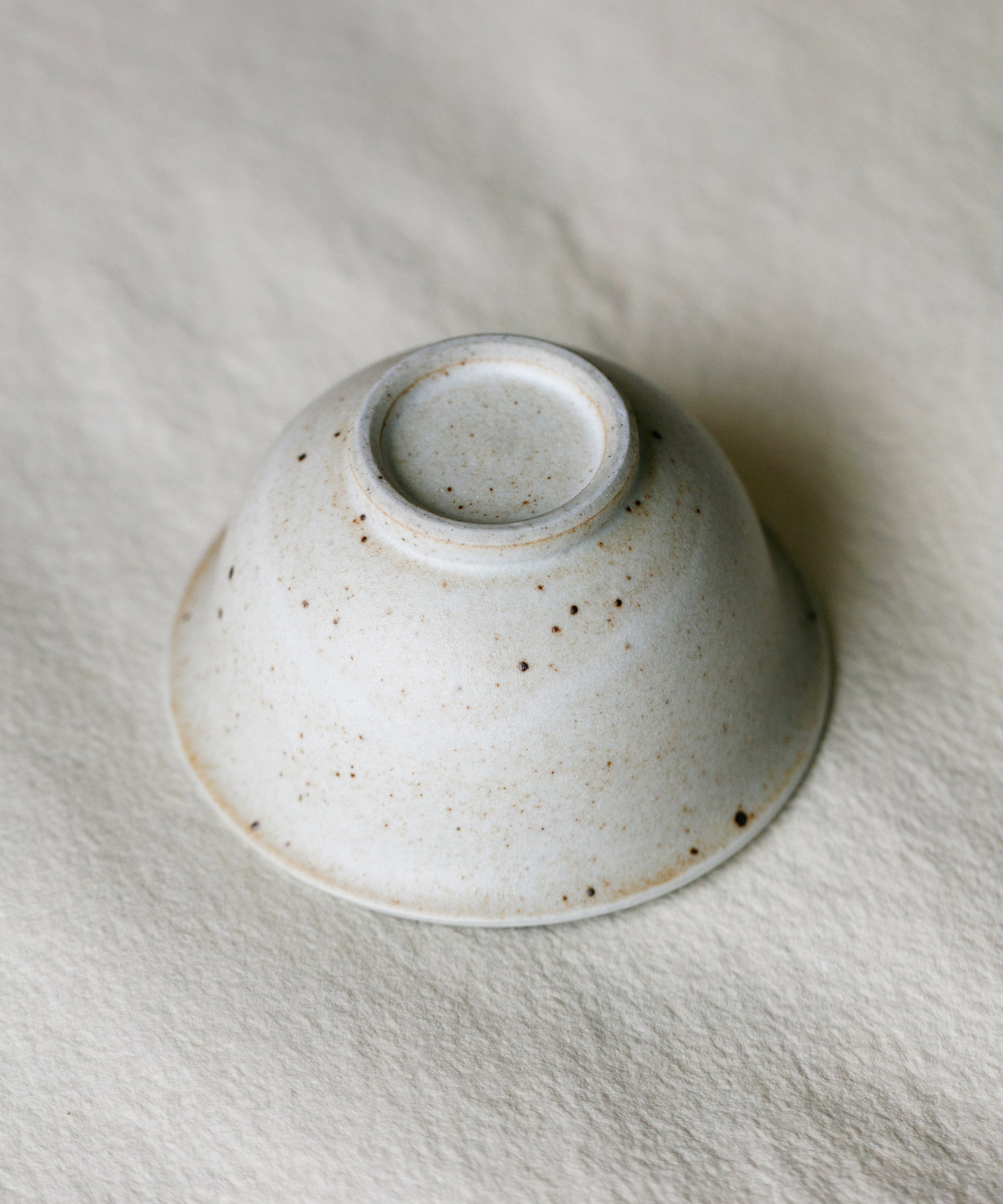 Matte Sunrise Cup underside, unglazed foot ring, Jingdezhen clay body, Wang Xinghua