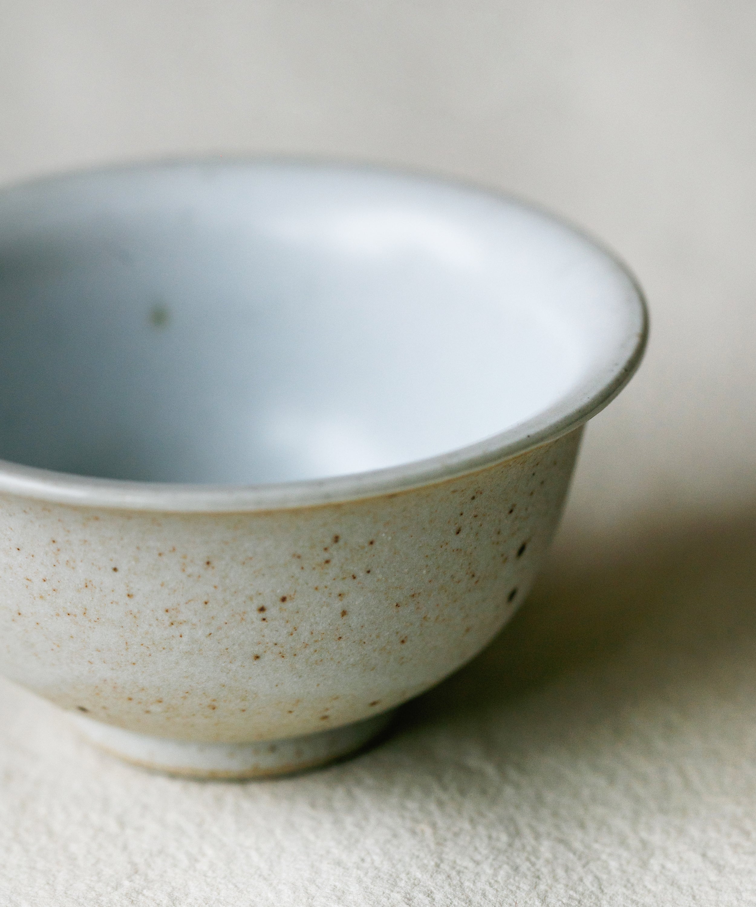 Matte Sunrise Cup glaze detail, warm matte sunrise surface, Jingdezhen clay and porcelain