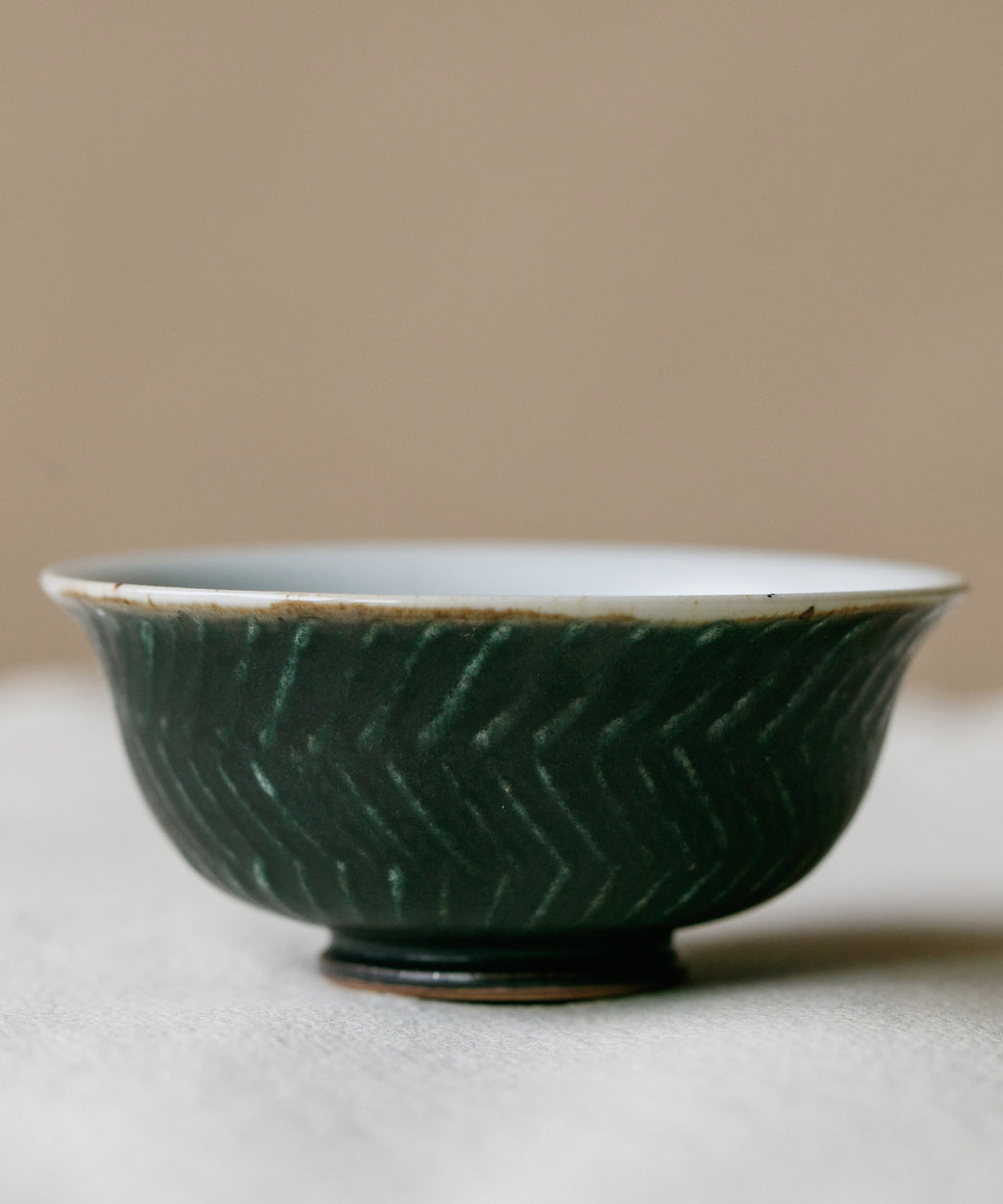 Forest Green Cup in hand, forest green glaze, Wang Xinghua gongfu teaware, Jingdezhen