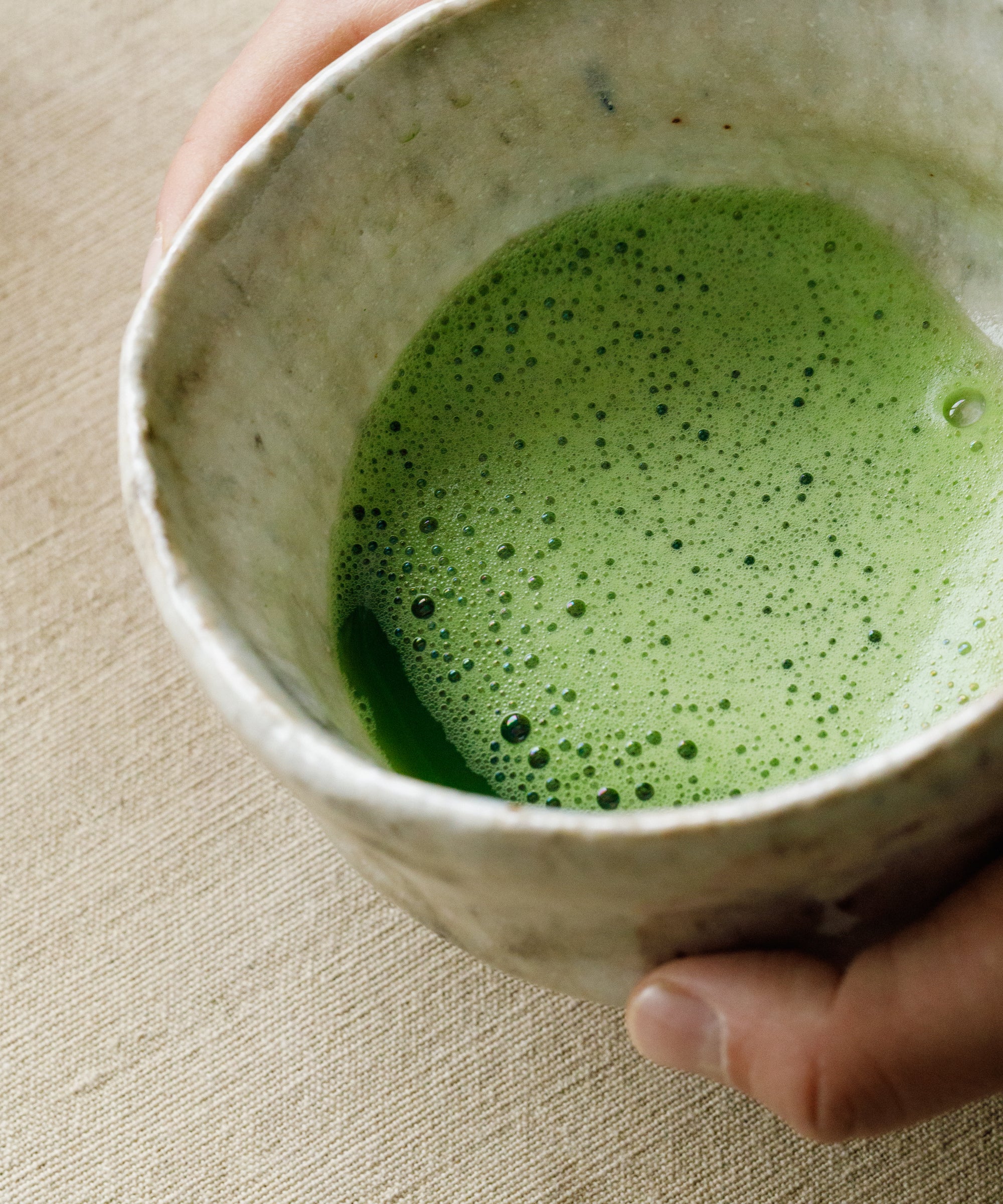 Whisked Matcha Kotobuki in bowl — structured, slick mouthfeel with long evolving finish, binchotan charcoal finished
