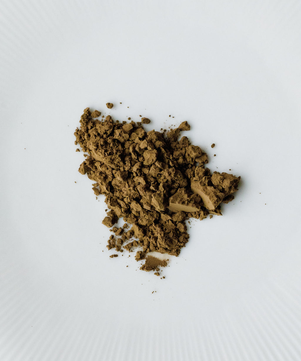 Uji Hojicha roasted green tea powder for latte in ceramic bowl