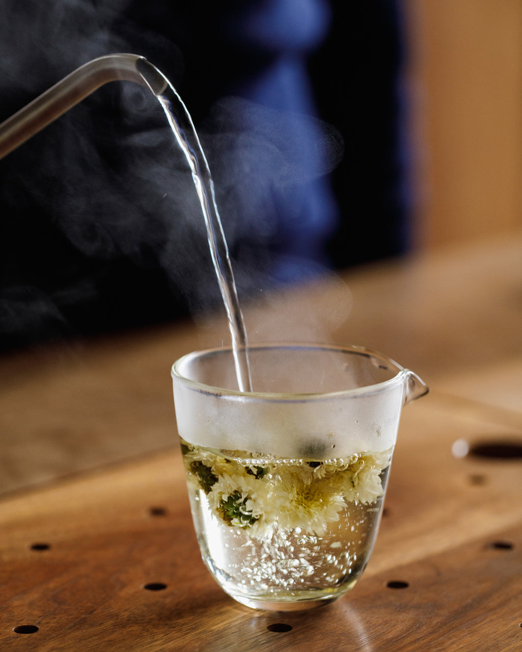 Hot water poured over Emperor's Chrysanthemum flowers