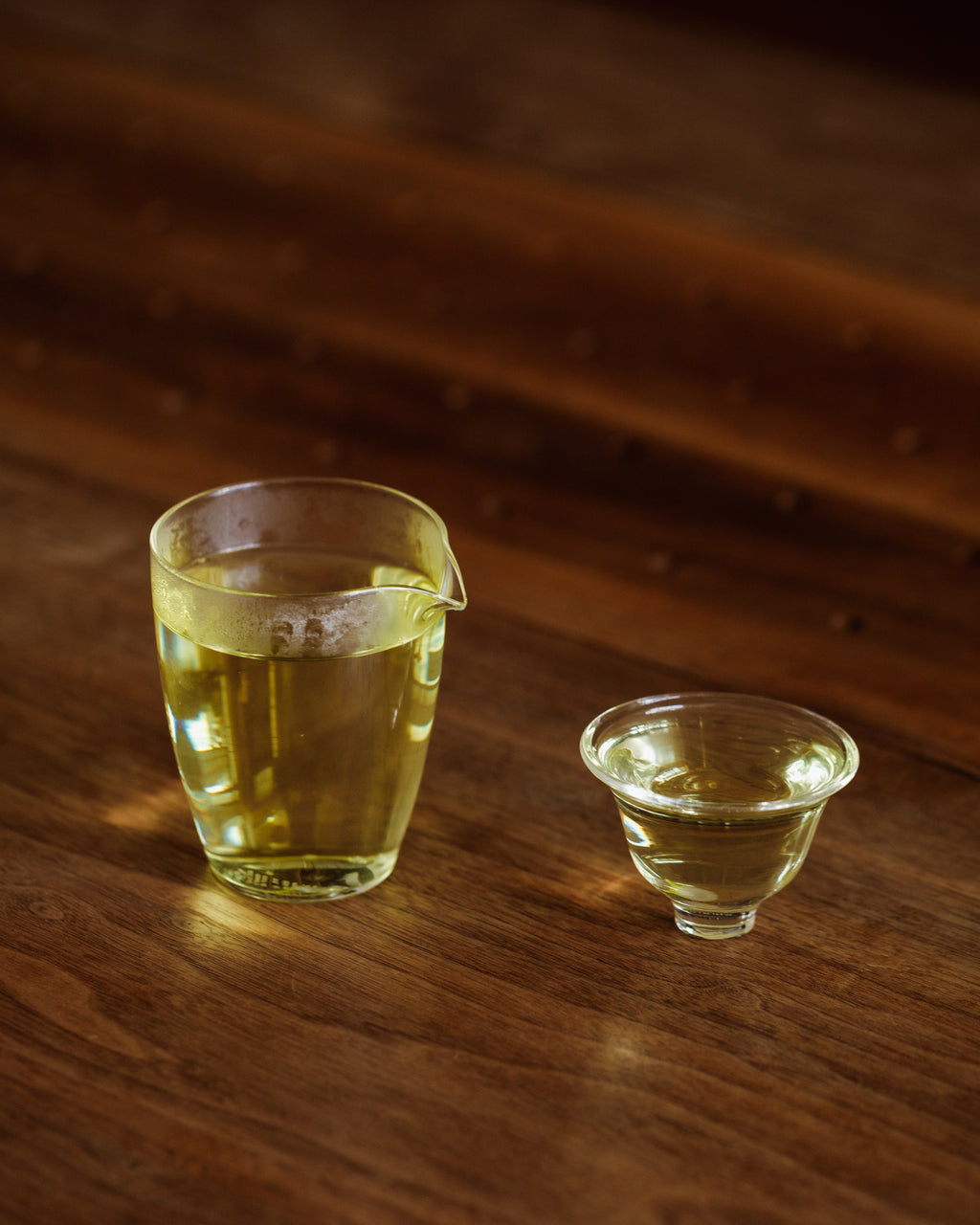 Cup of Emperor's Chrysanthemum tisane showing clear golden color