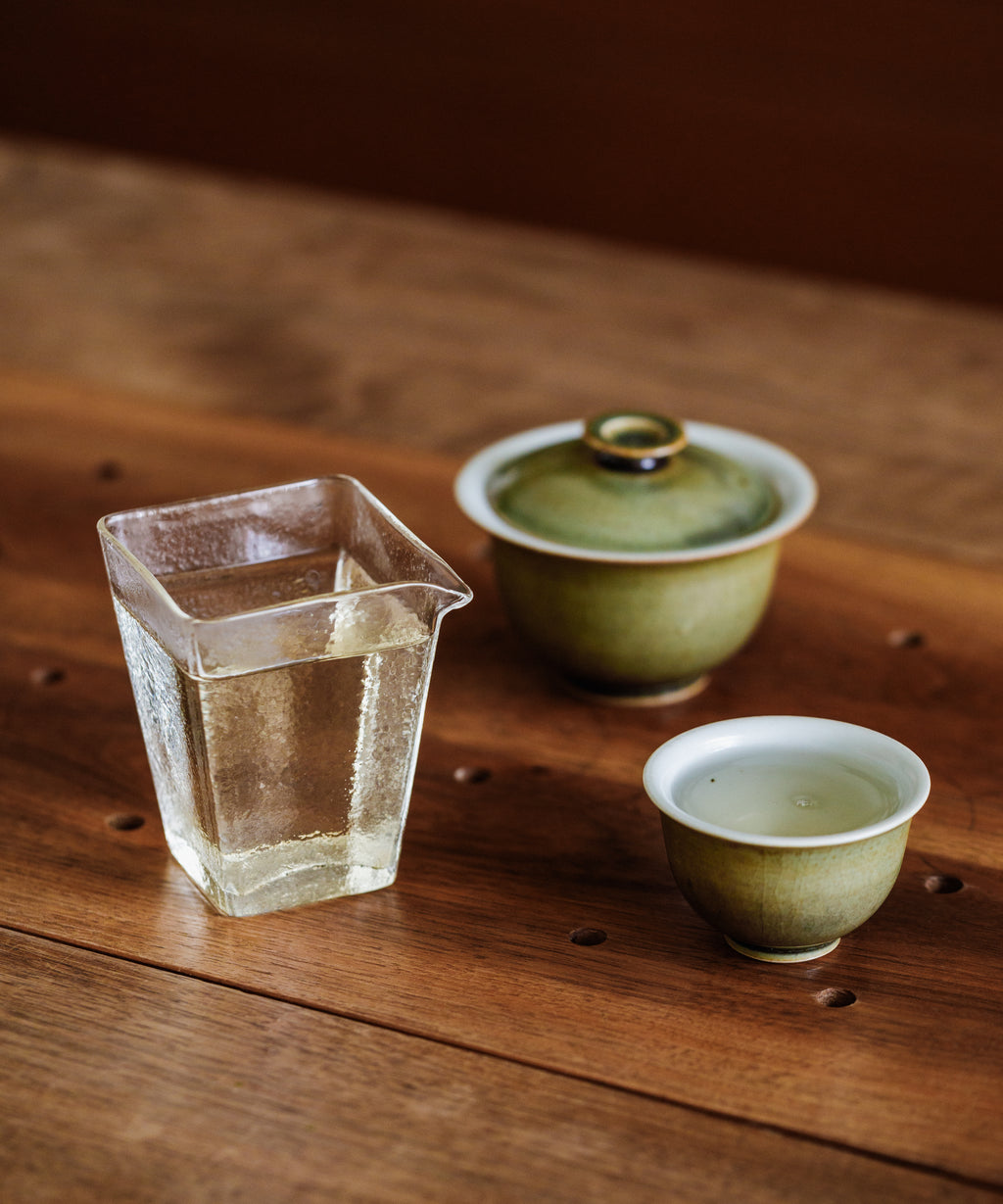 Daxueshan wild pu'erh shoots close-up — sun-dried and charcoal roasted ancient tree buds, March 2025