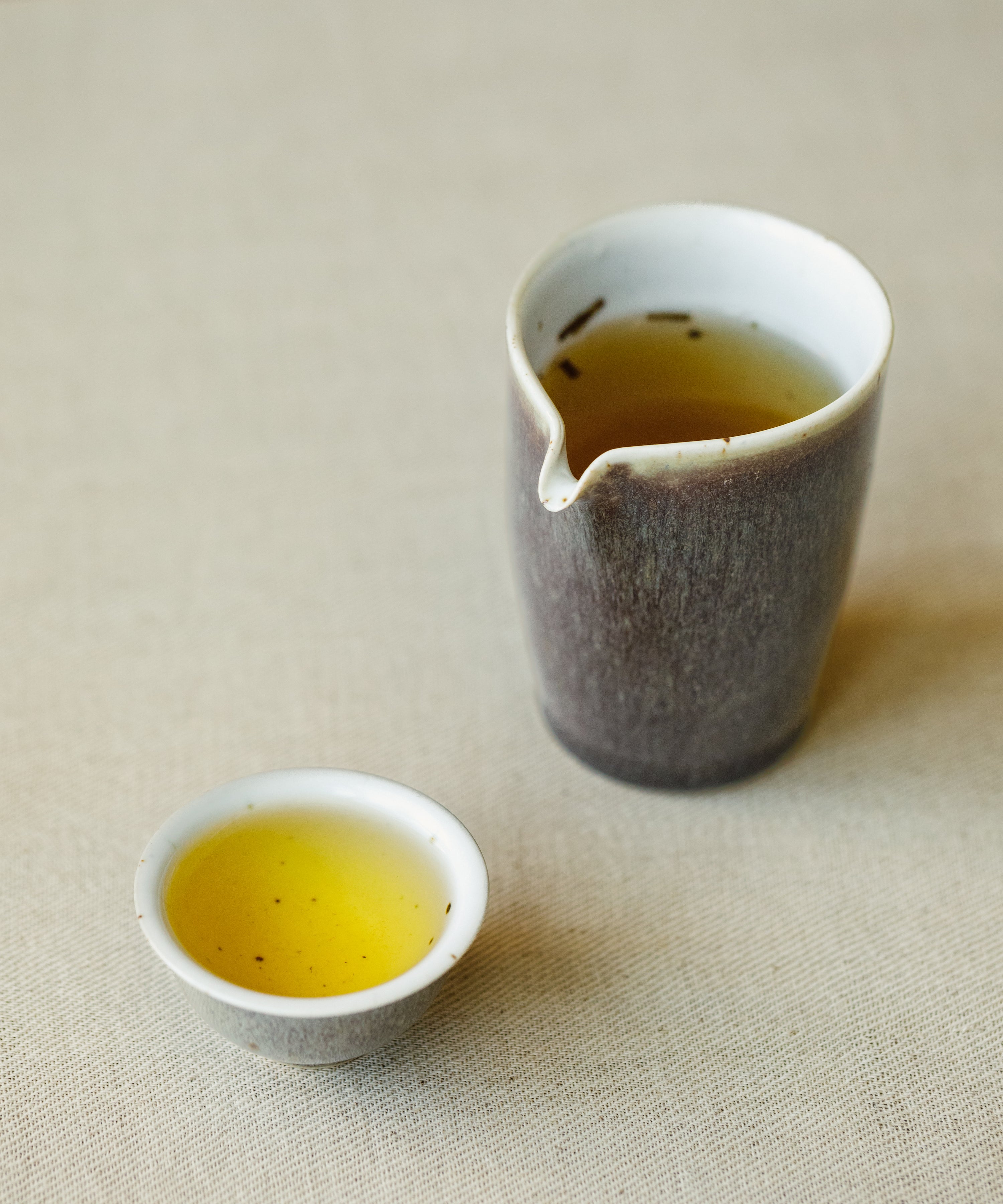 Brewed Noma Hojicha Shizu 7132 showing golden liquor with sakura finish