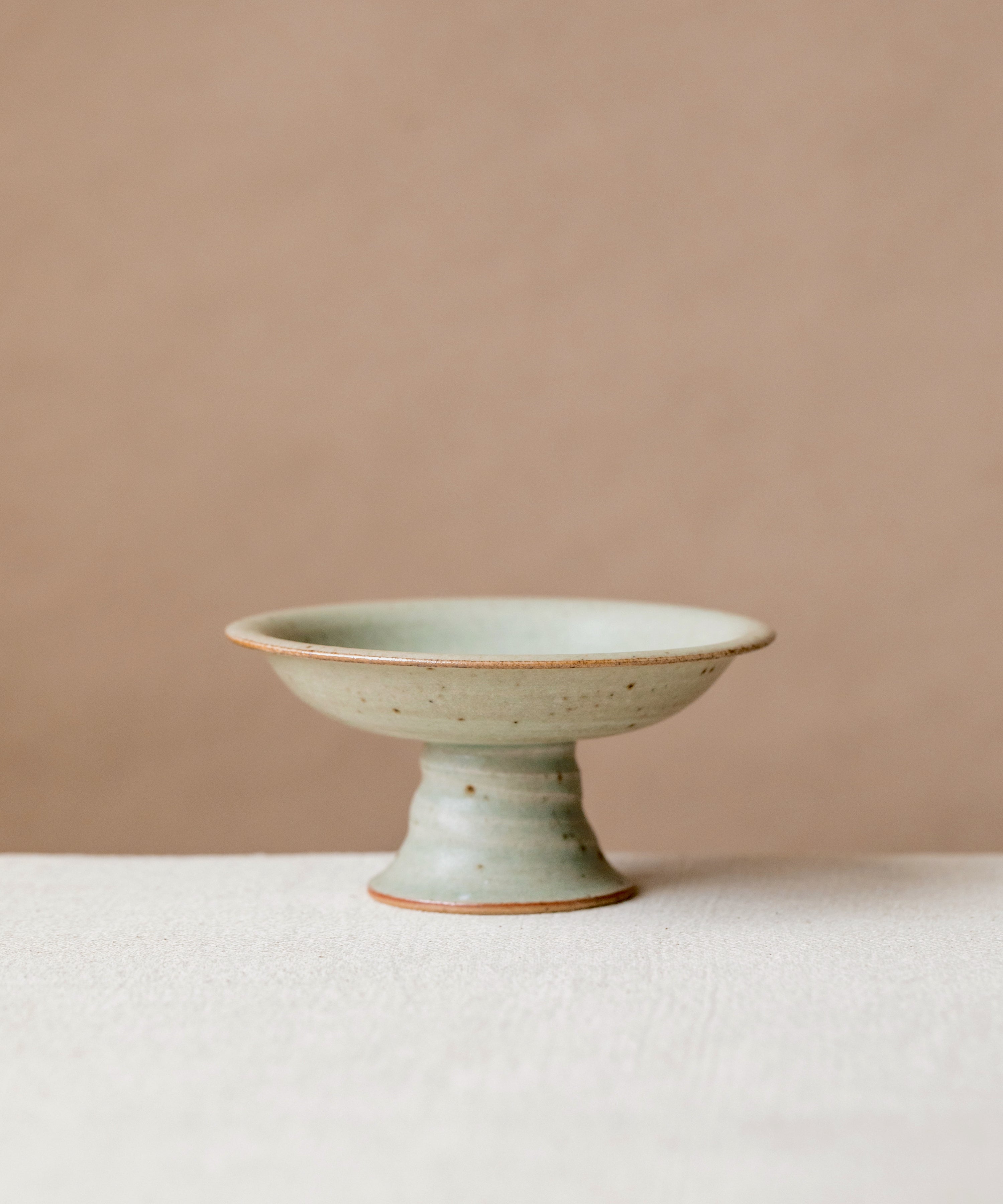 Pedestal Plate Faded Robin's Egg, handcrafted pedestal plate by Wang Xinghua, Jingdezhen, pastel aqua glaze