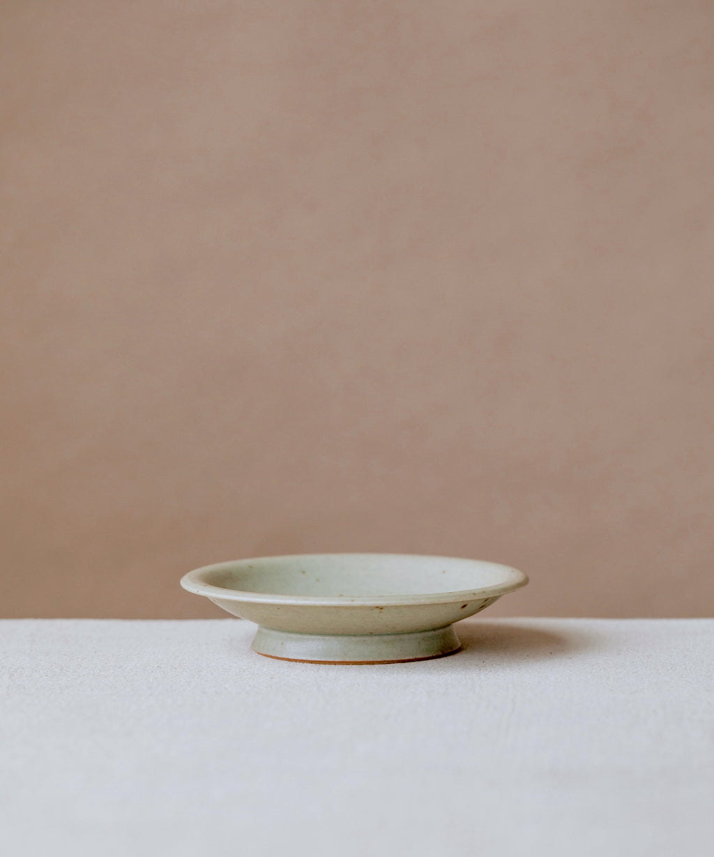 Etched Plate Faded Robin's Egg, handcrafted plate by Wang Xinghua, Jingdezhen, pastel aqua glaze with etched pattern