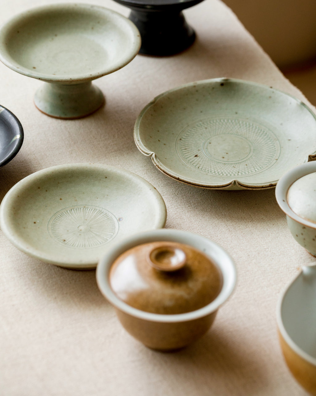 Scalloped Plate Faded Robin's Egg underside, unglazed base, Jingdezhen clay body, Wang Xinghua