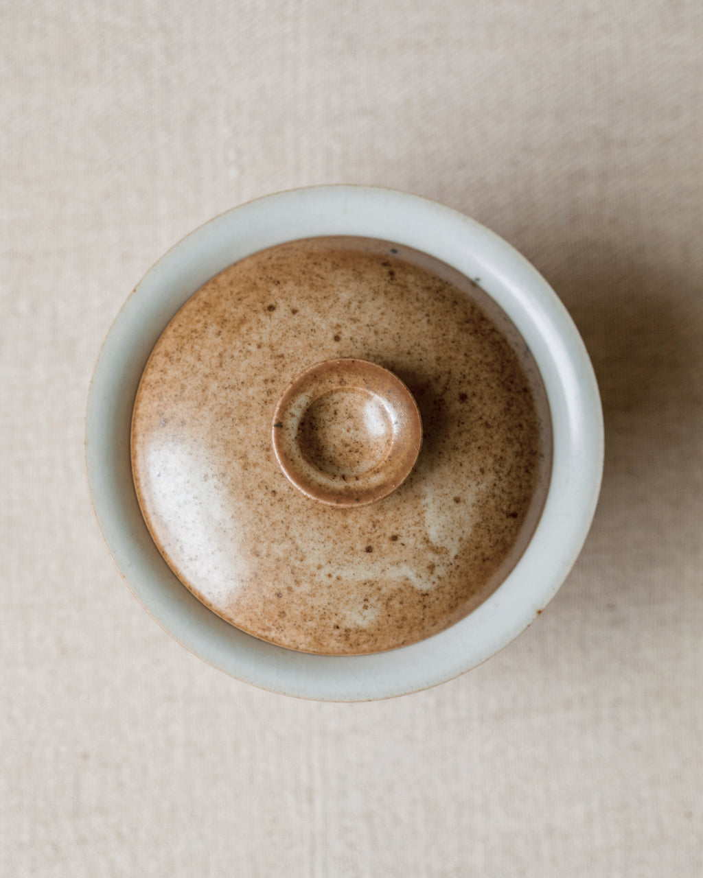 Gaiwan Sand Dune interior, rust-marked glaze detail, handcrafted by Wang Xinghua, Jingdezhen