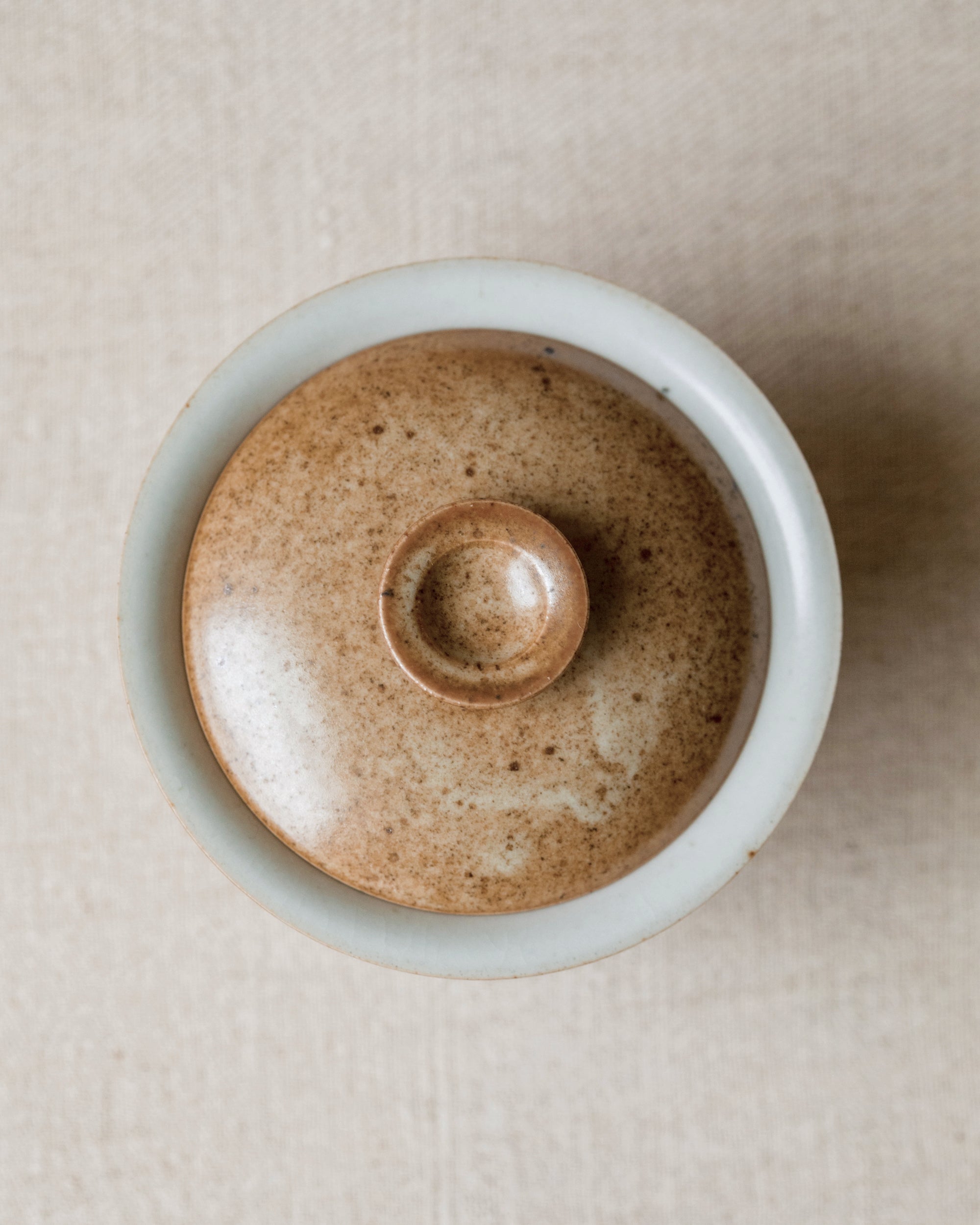 Gaiwan Sand Dune interior, rust-marked glaze detail, handcrafted by Wang Xinghua, Jingdezhen