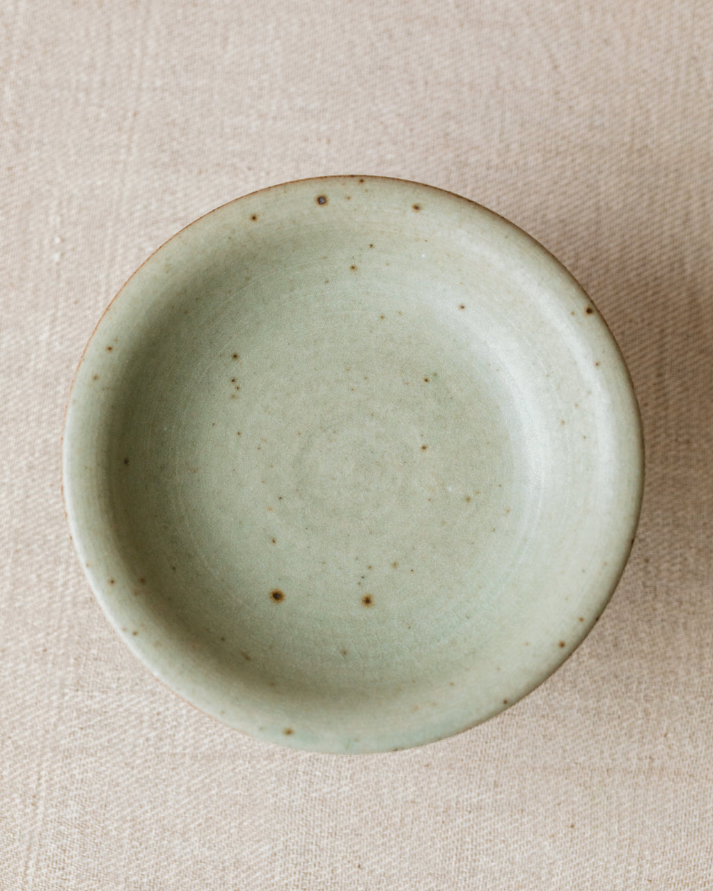 Pedestal Plate Faded Robin's Egg side view, raised pedestal form, handcrafted by Wang Xinghua, Jingdezhen