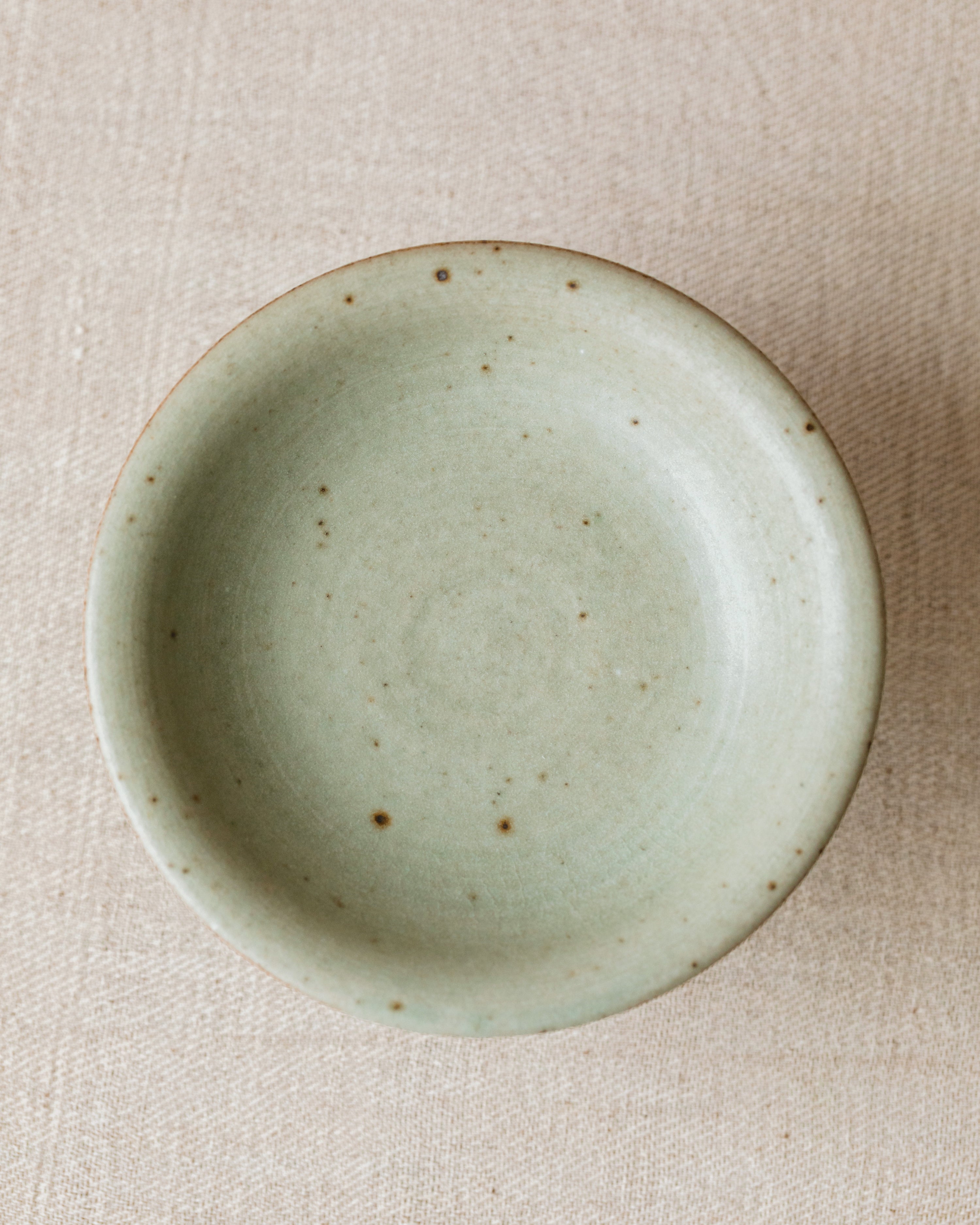 Pedestal Plate Faded Robin's Egg side view, raised pedestal form, handcrafted by Wang Xinghua, Jingdezhen
