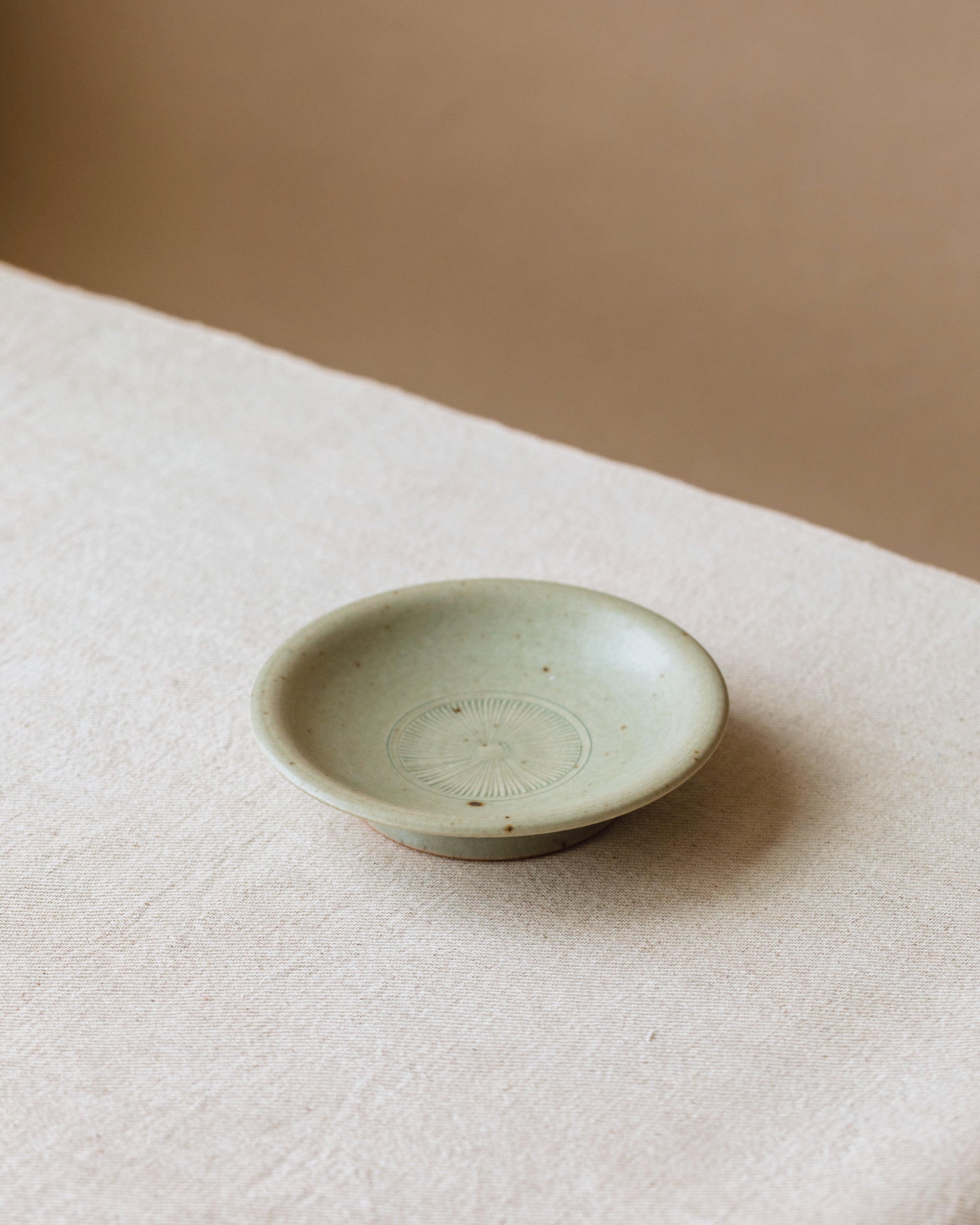Etched Plate Faded Robin's Egg top view, etched pattern on pastel aqua, Wang Xinghua ceramics