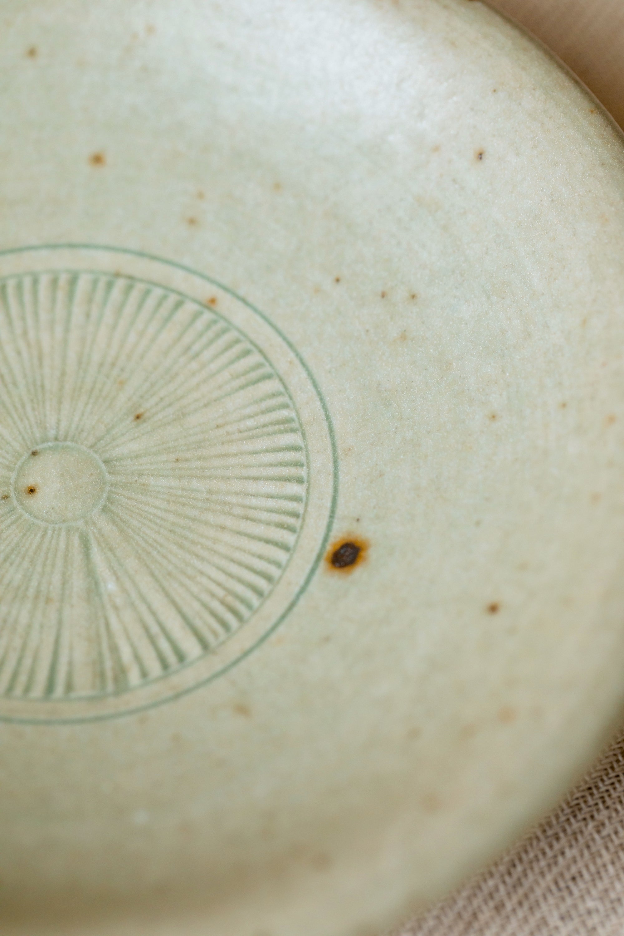 Etched Plate Faded Robin's Egg underside, unglazed base, Jingdezhen clay body, Wang Xinghua