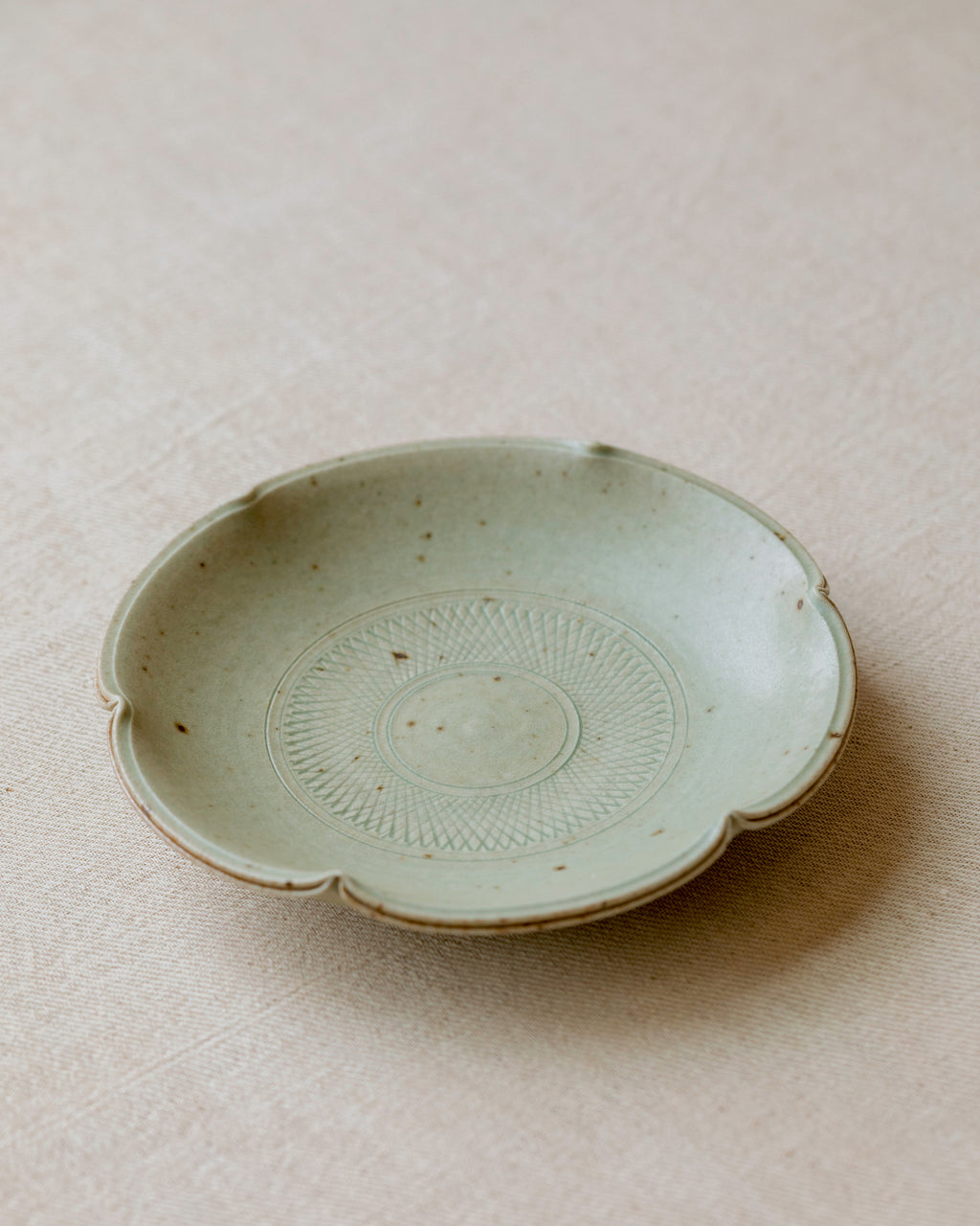 Scalloped Plate Faded Robin's Egg glaze detail, faded robin's egg surface, Jingdezhen clay and porcelain