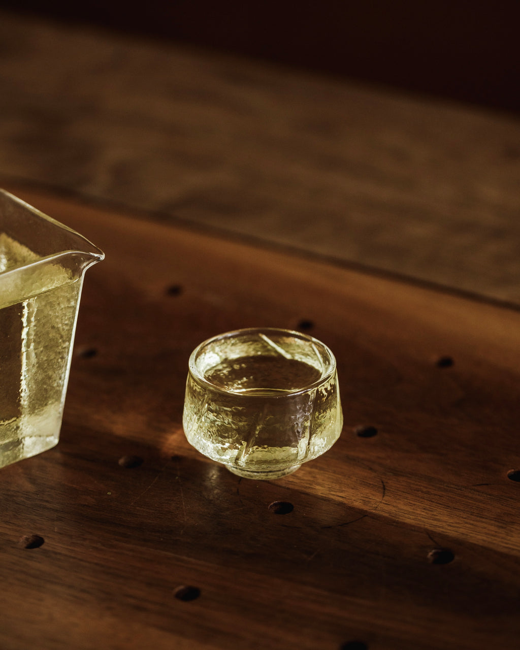 Brewed Gold Osmanthus poured into a cup showing golden liquor