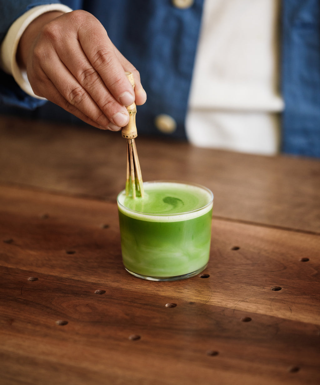Whisking Saeakari matcha for latte preparation
