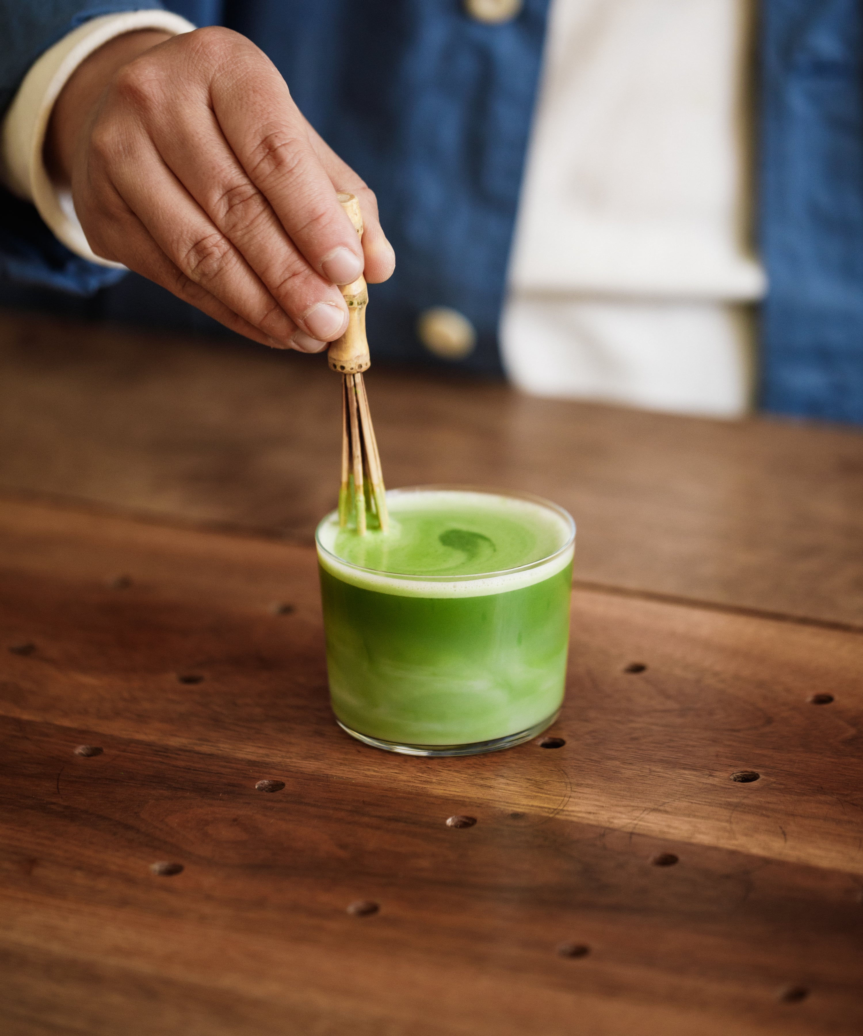 Whisking Saeakari matcha for latte preparation