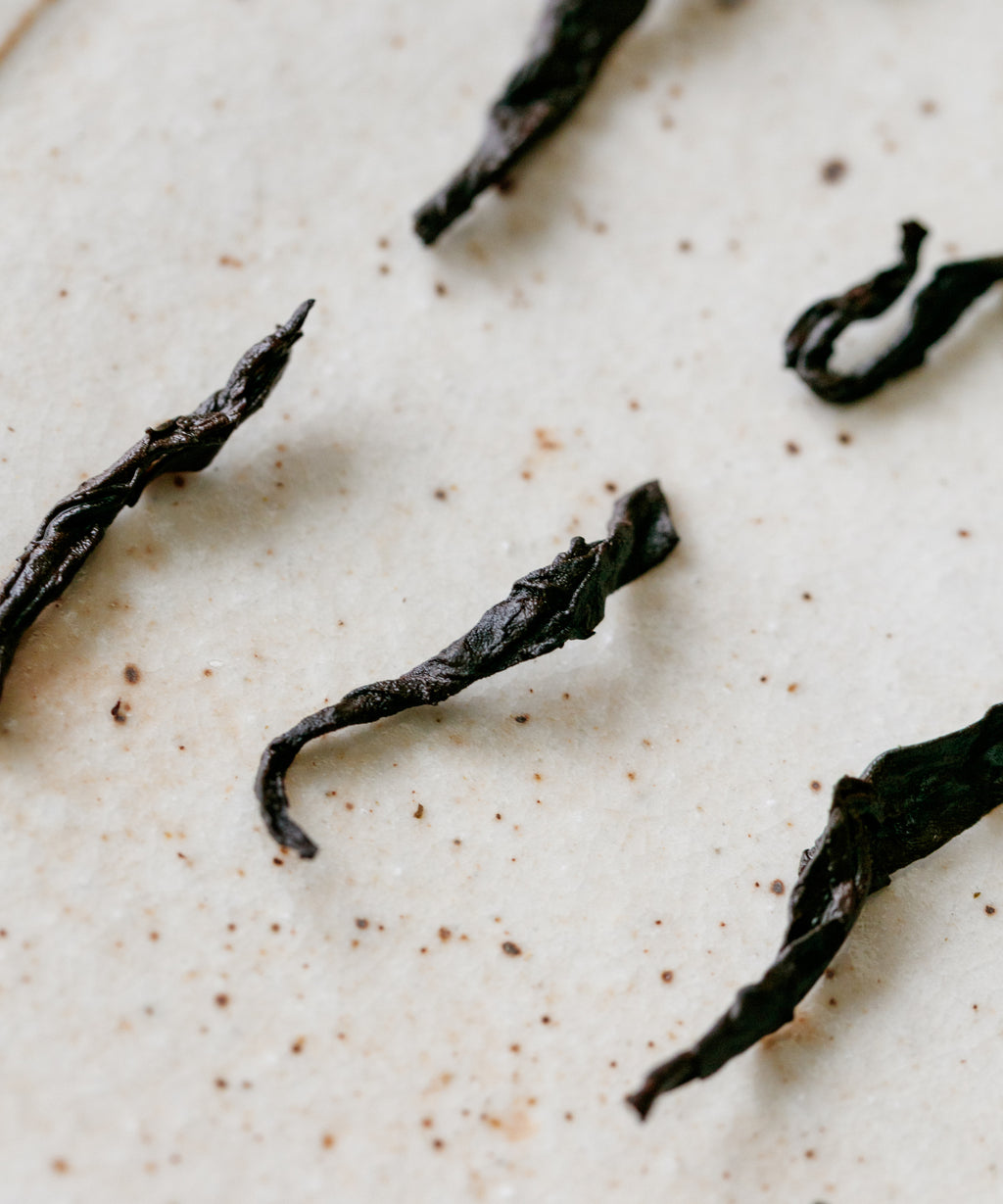 Xigui Shou liquor — ruby red ripe pu'erh, broth-like mouthfeel from ancient Xigui trees, Lincang, Yunnan