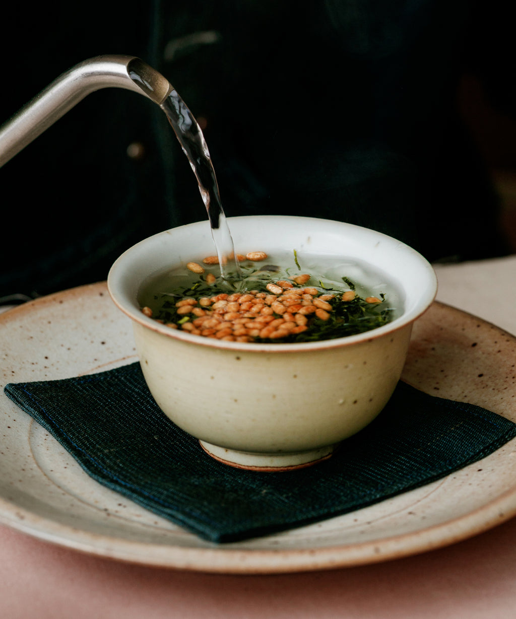 Kaga Genmaicha in a white porcelain vessel ready for brewing