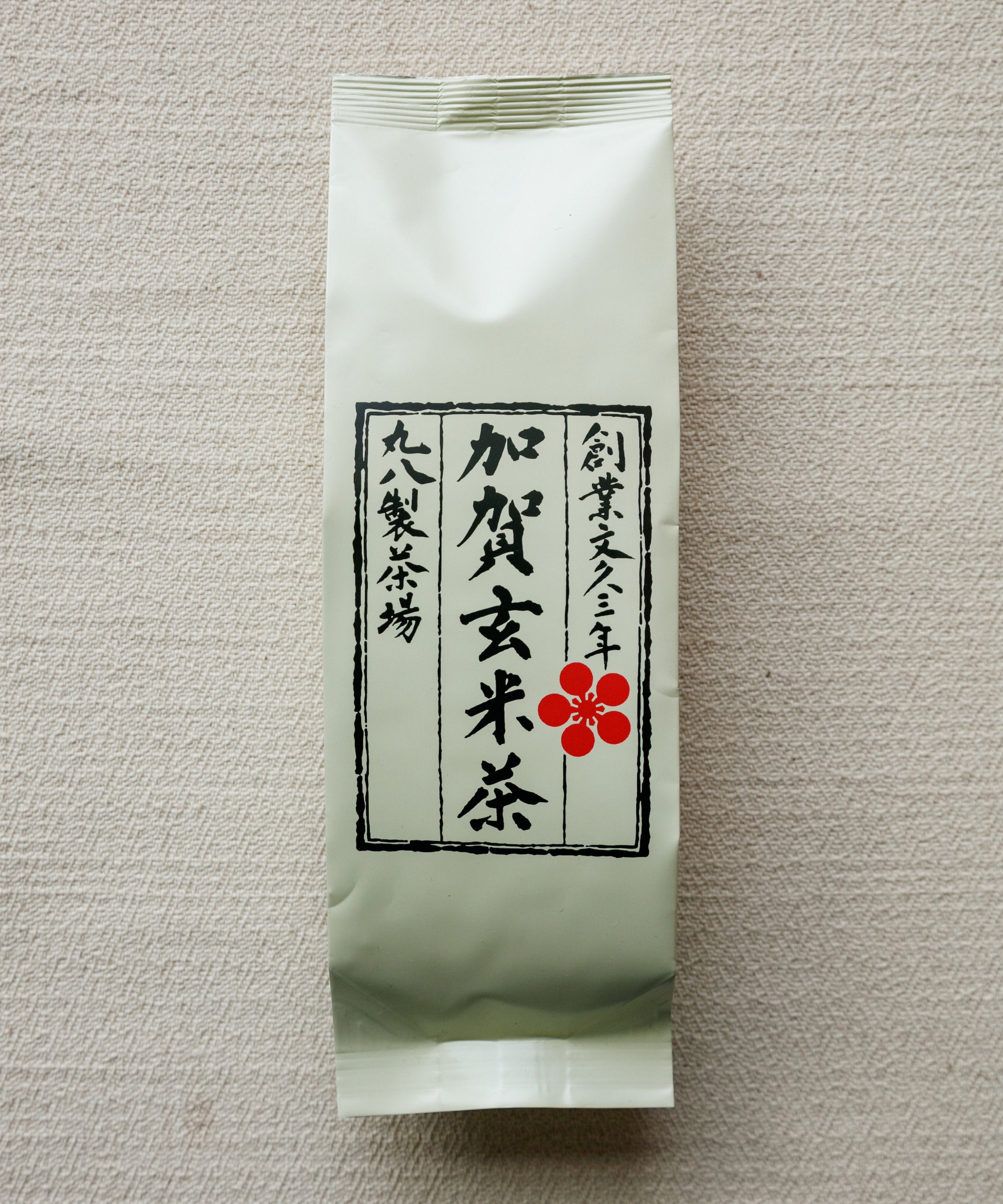 Wet Kaga Genmaicha leaves after brewing showing the sencha and rice grains
