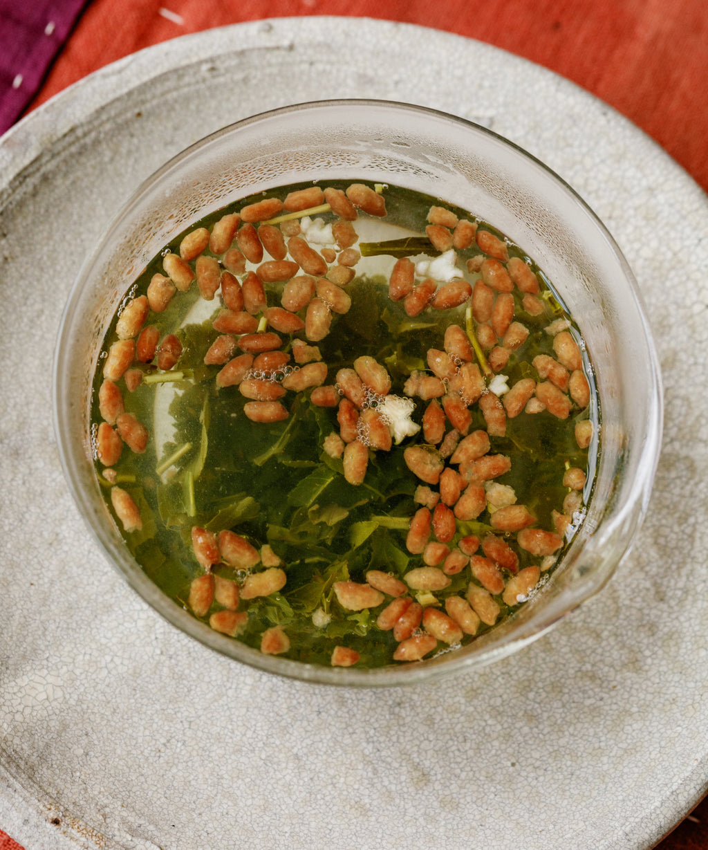 Yakushima Genmaicha liquor — luminous green with chlorophyll and cakey rice sweetness