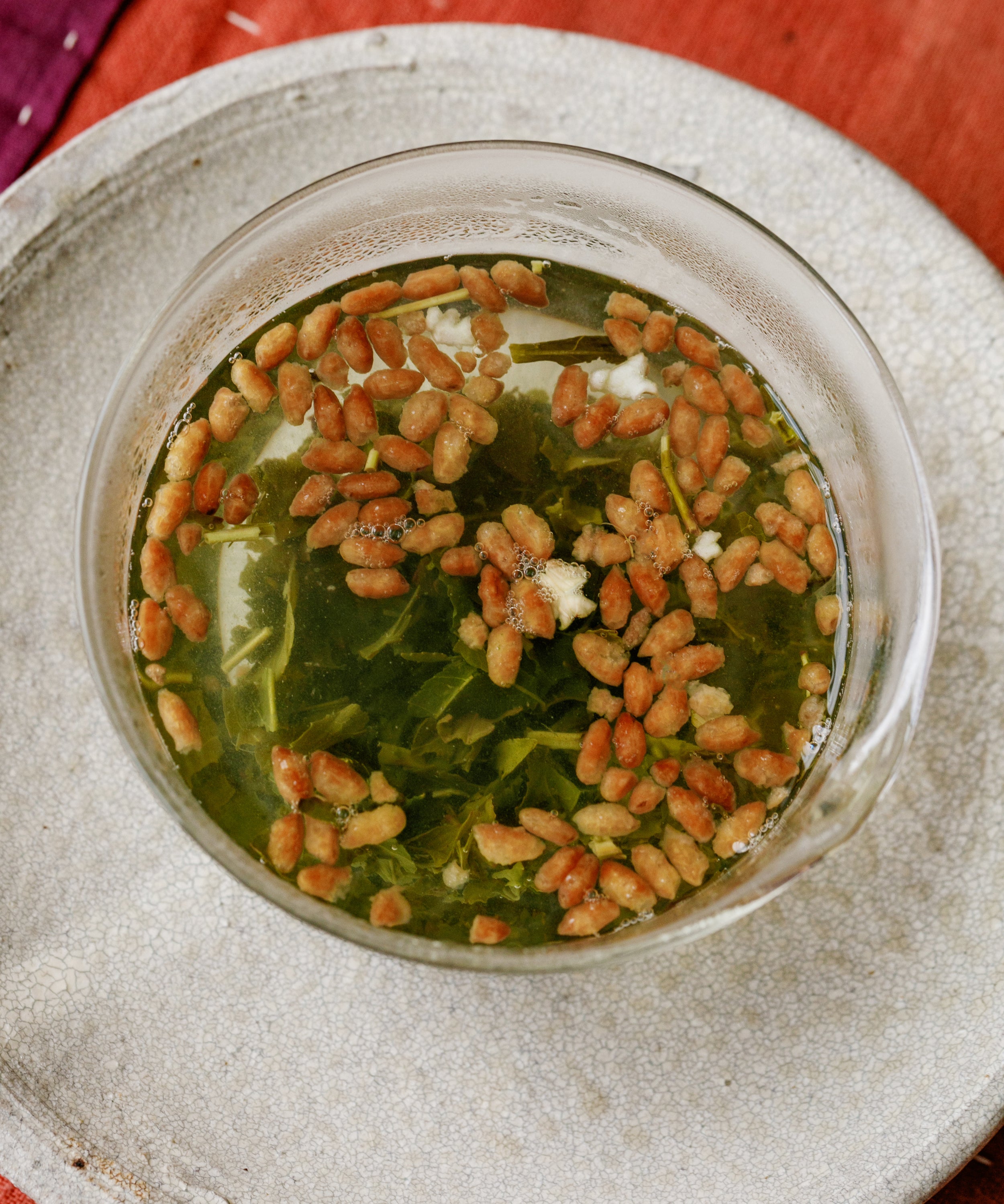 Yakushima Genmaicha liquor — luminous green with chlorophyll and cakey rice sweetness