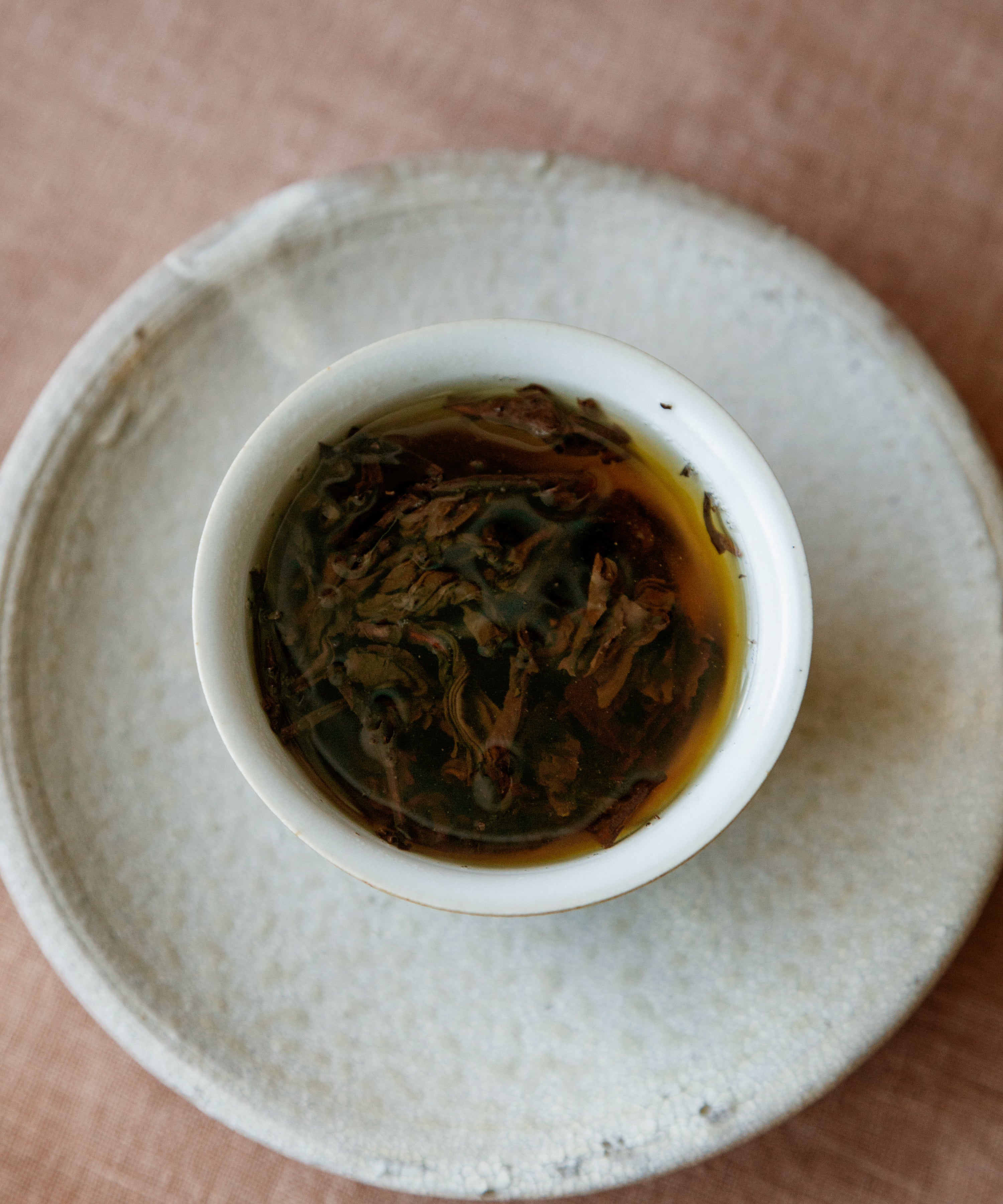 Sun-Dried Dragon Pearl liquor — malty, glutinous with ferment, hay, and mineral density, Lincang