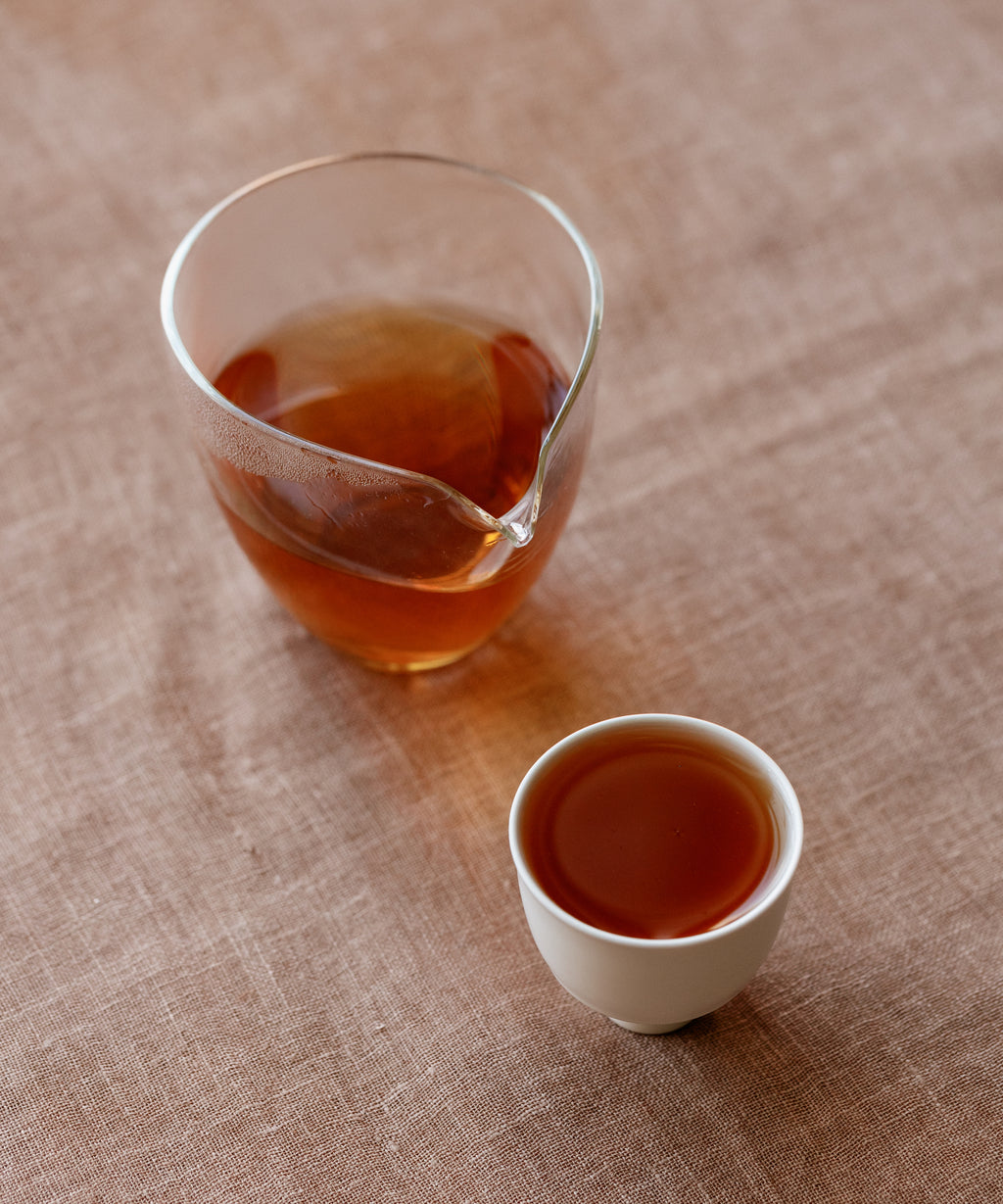 Osmanthus Laoshan Black wet leaves — osmanthus flowers and Laoshan black tea, Shandong