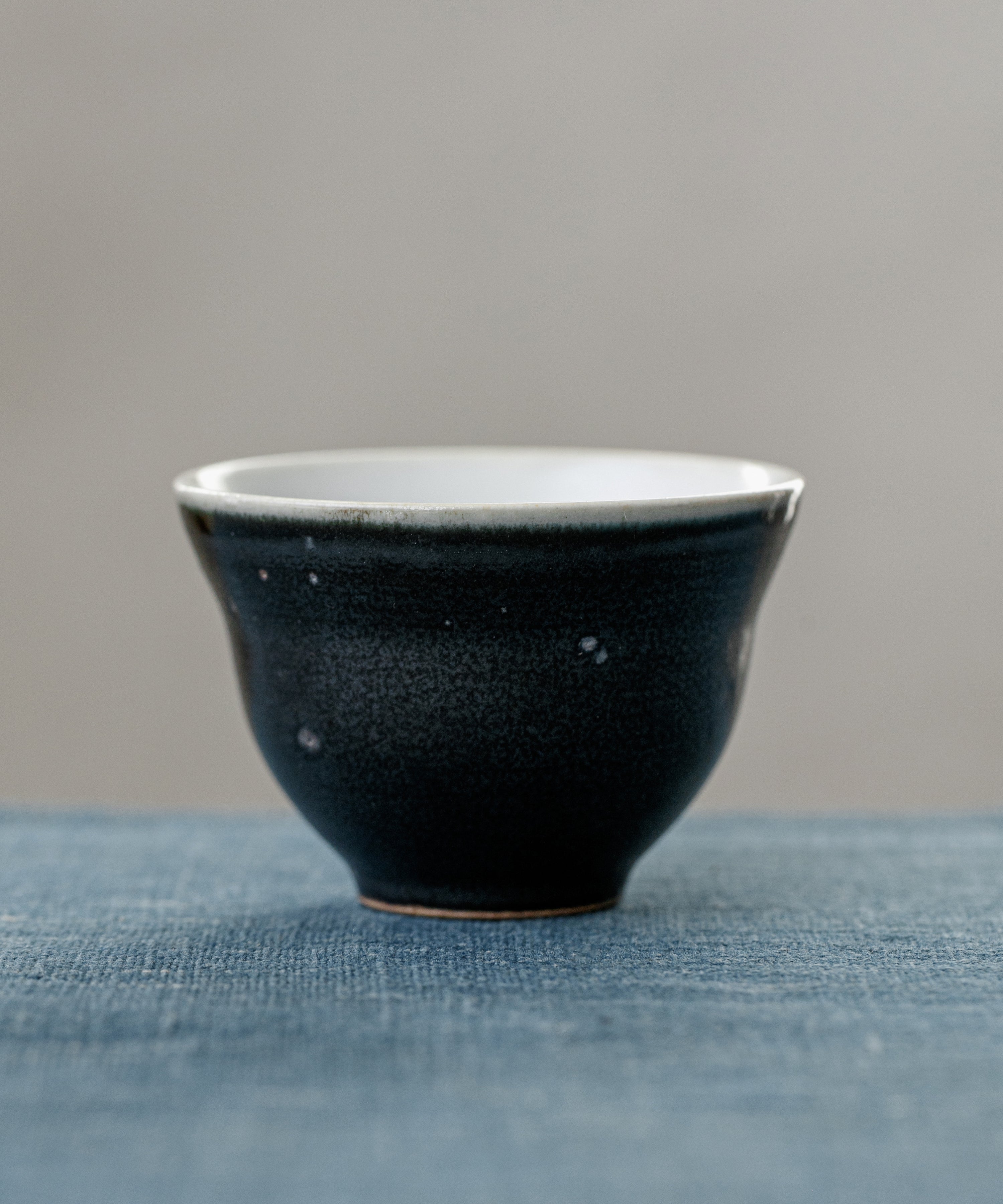Matte Black Cup, handcrafted tea cup by Wang Xinghua, Jingdezhen, matte black glaze