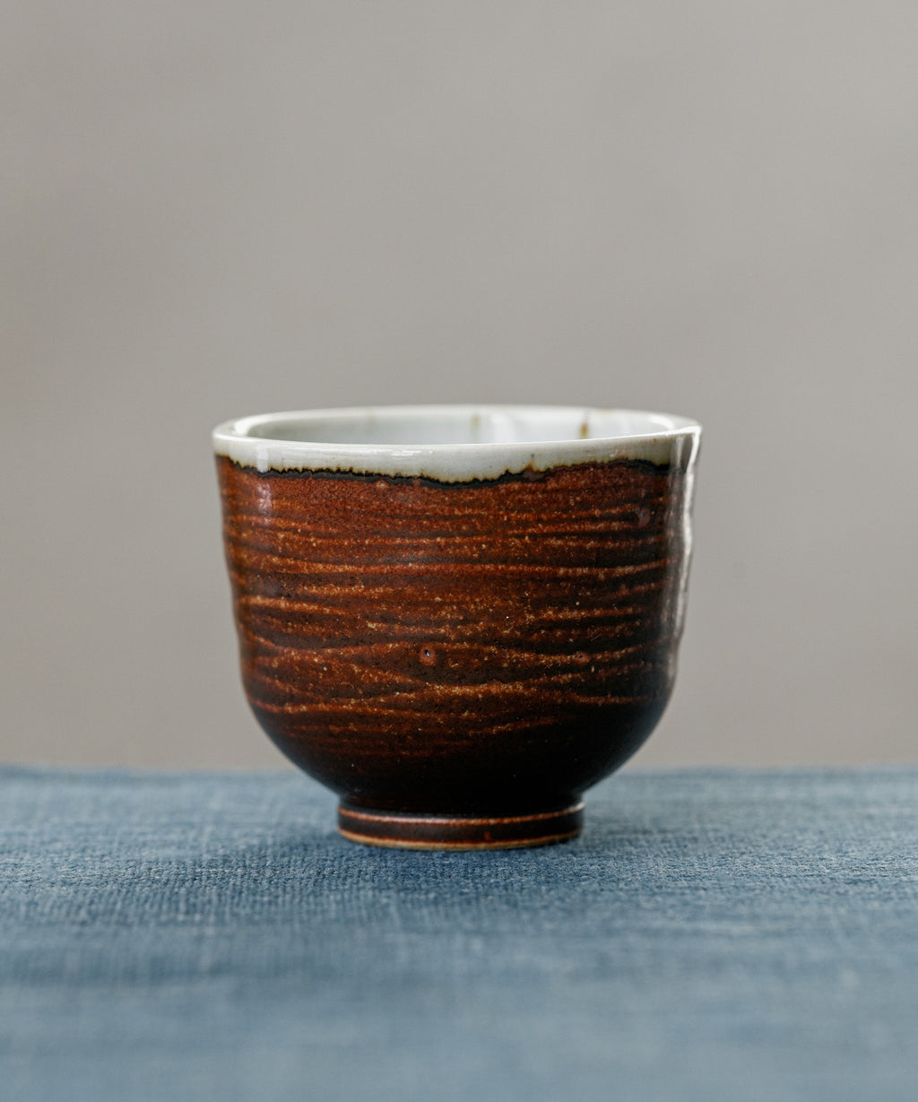 Earth Brown Cup, handcrafted tea cup by Wang Xinghua, Jingdezhen, earth brown glaze