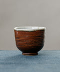 Earth Brown Cup, handcrafted tea cup by Wang Xinghua, Jingdezhen, earth brown glaze