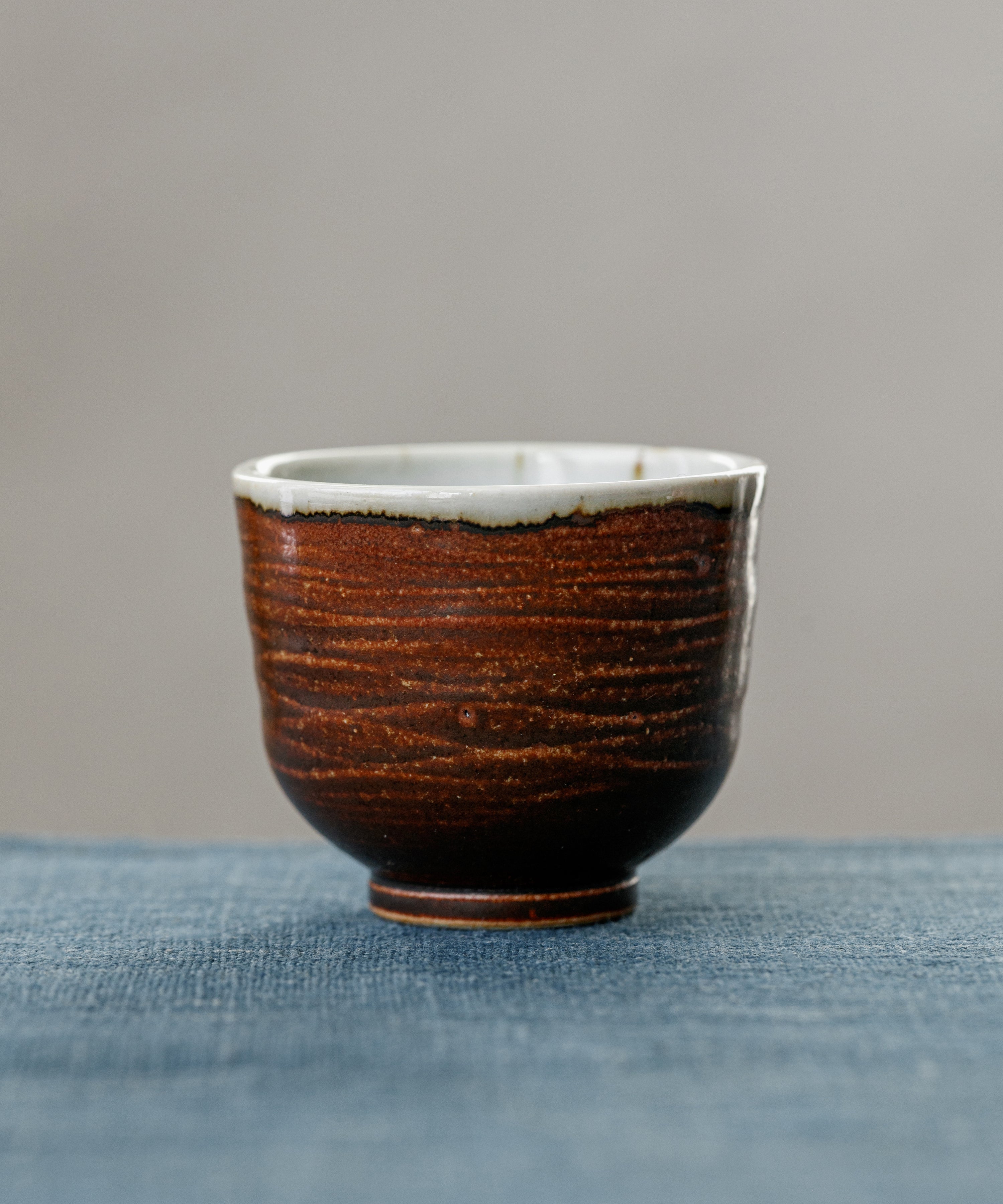 Earth Brown Cup, handcrafted tea cup by Wang Xinghua, Jingdezhen, earth brown glaze