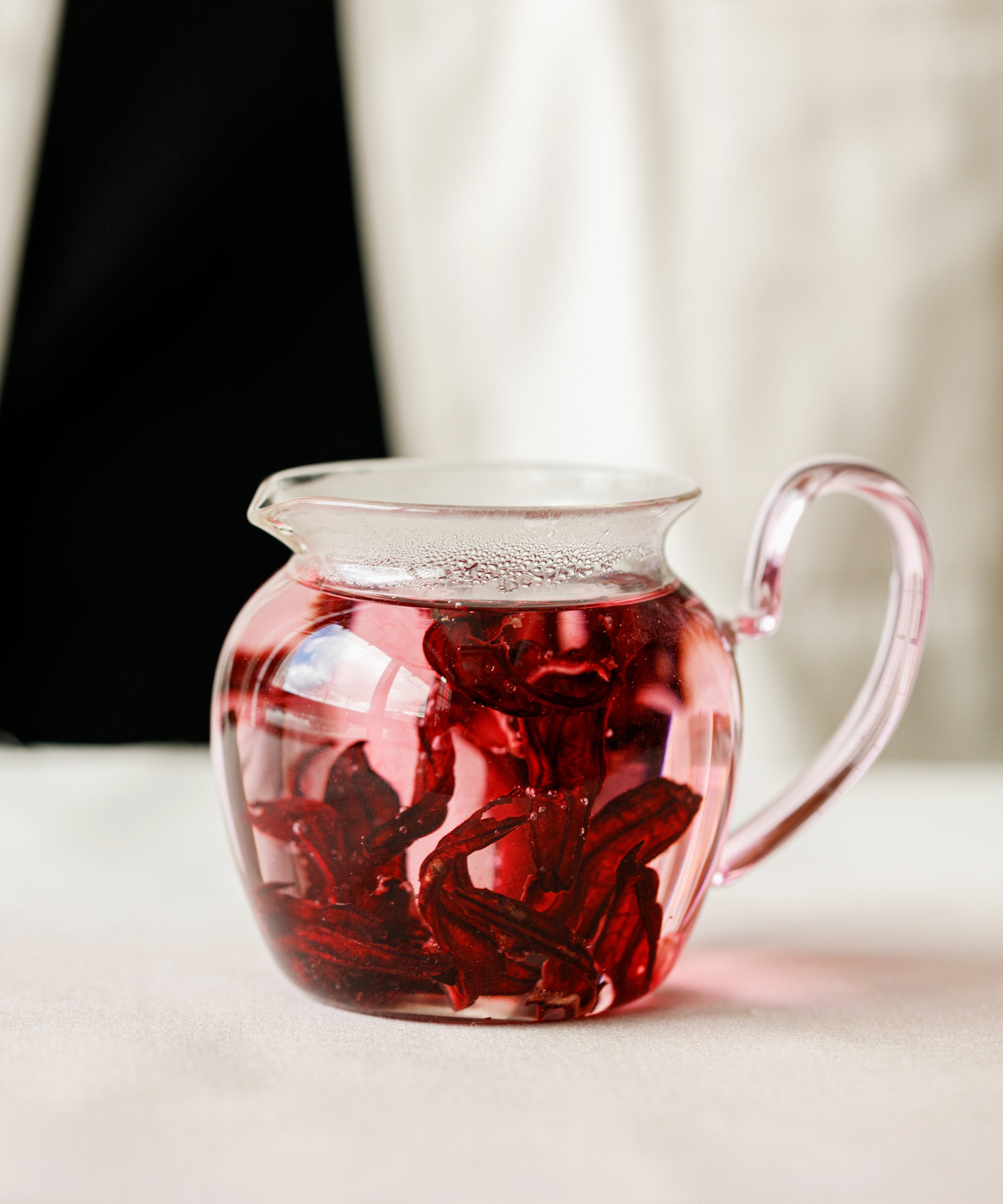 Brewing Hibiscus — organic hibiscus flowers reanimating in water, Yongan, Fujian