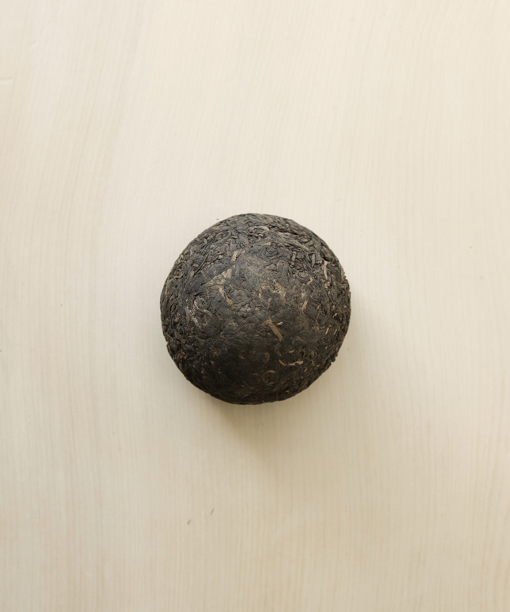 Tuocha shou pu'erh from Xiaguan — dome-shaped ripe pu'erh cake aged since 2007, Xishuangbanna, Yunnan