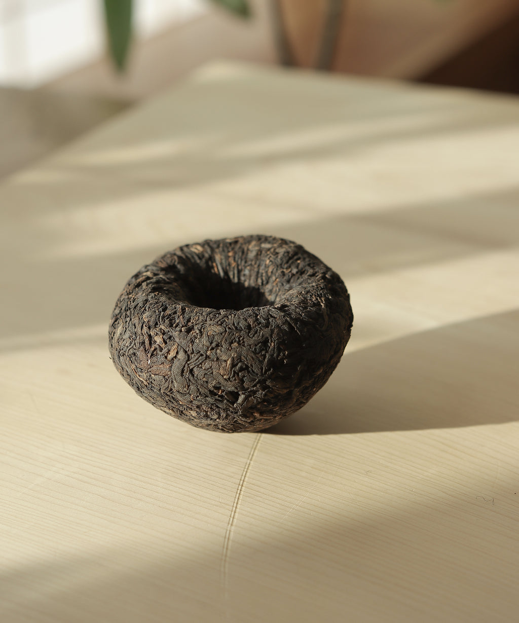 Tuocha liquor — aged shou pu'erh with light, refreshing mouthfeel and earthy sweetness