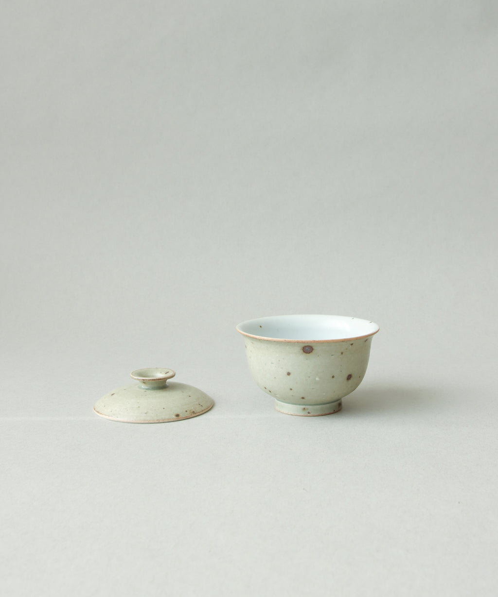 Green Celadon Gaiwan Type III in hand, matte green celadon surface, Wang Xinghua gongfu teaware