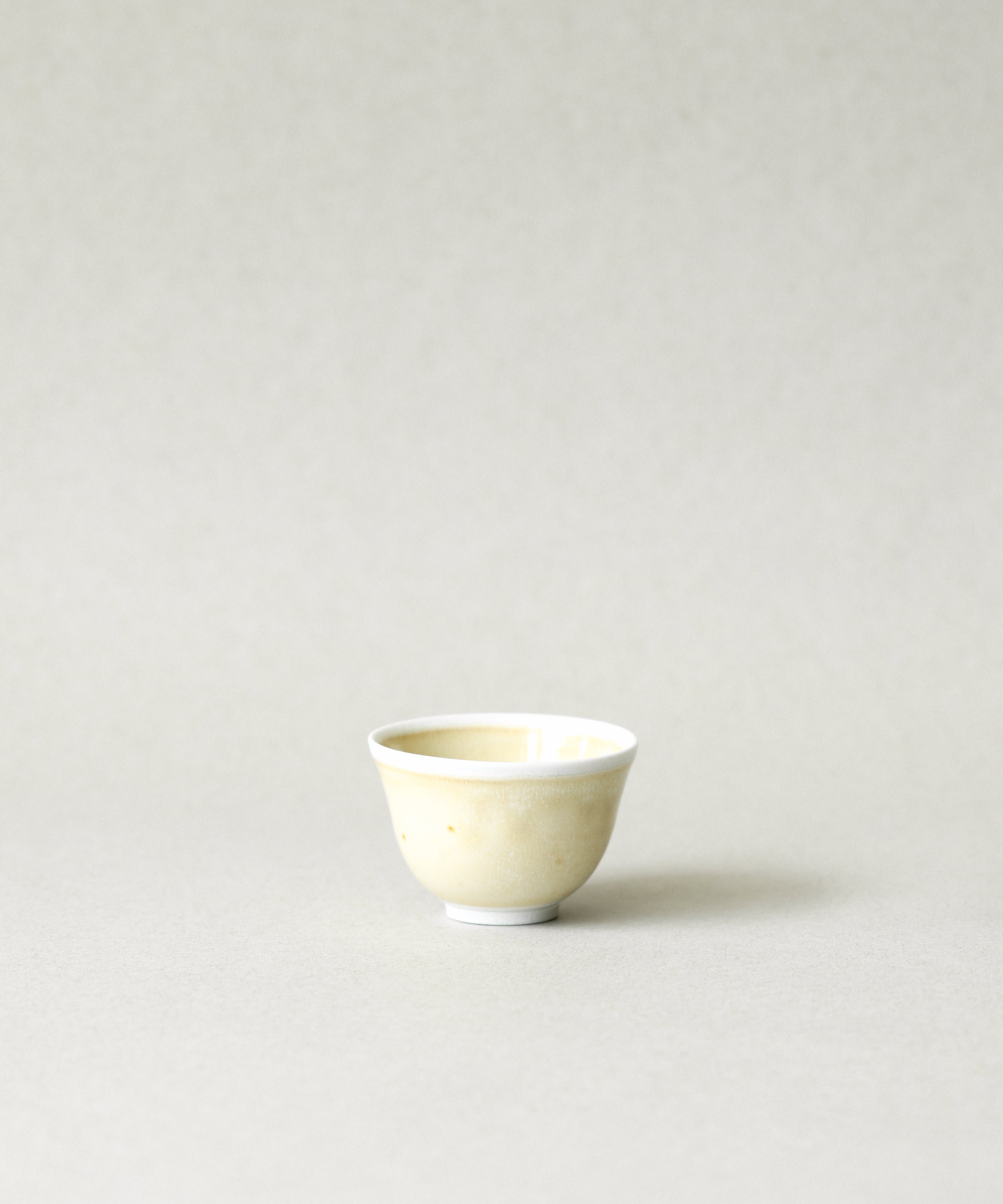 Yellow Bamboo Tea Cup handcrafted soda-fired tea cup by Wei Cheng, Burnaby BC