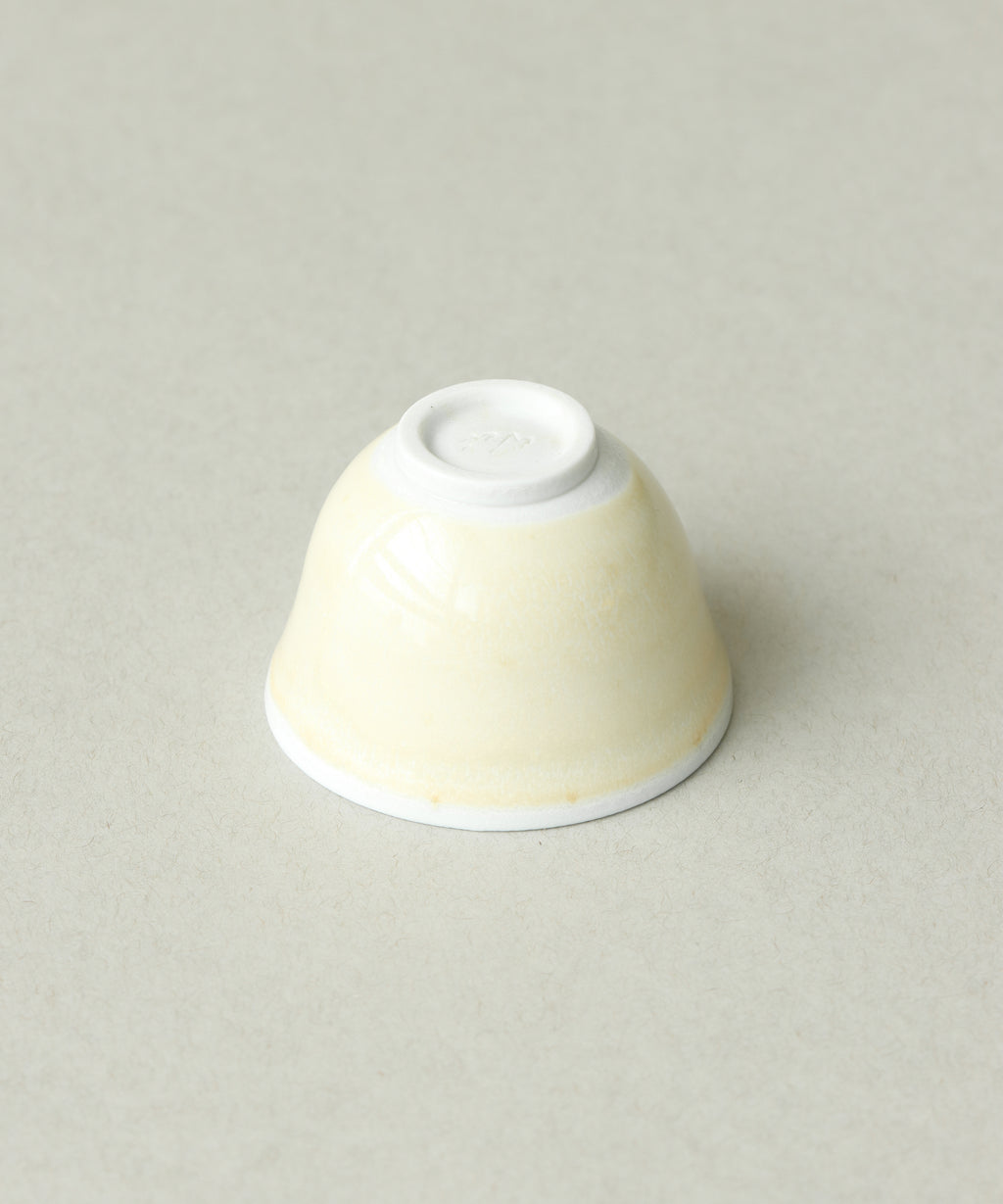 Yellow Bamboo Tea Cup underside, soda-fired porcelain clay body