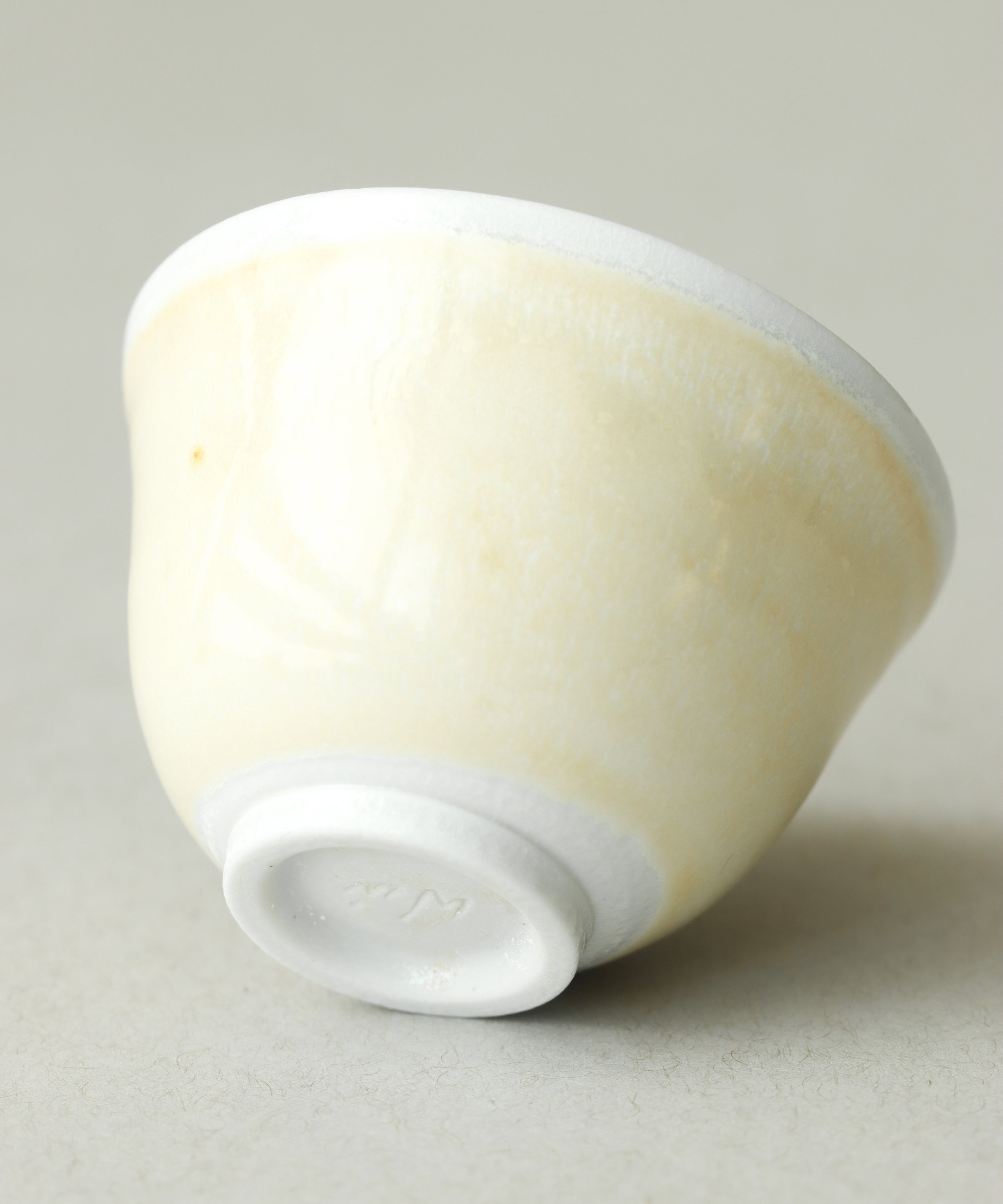 Yellow Bamboo Tea Cup side profile, elegant shape on porcelain body