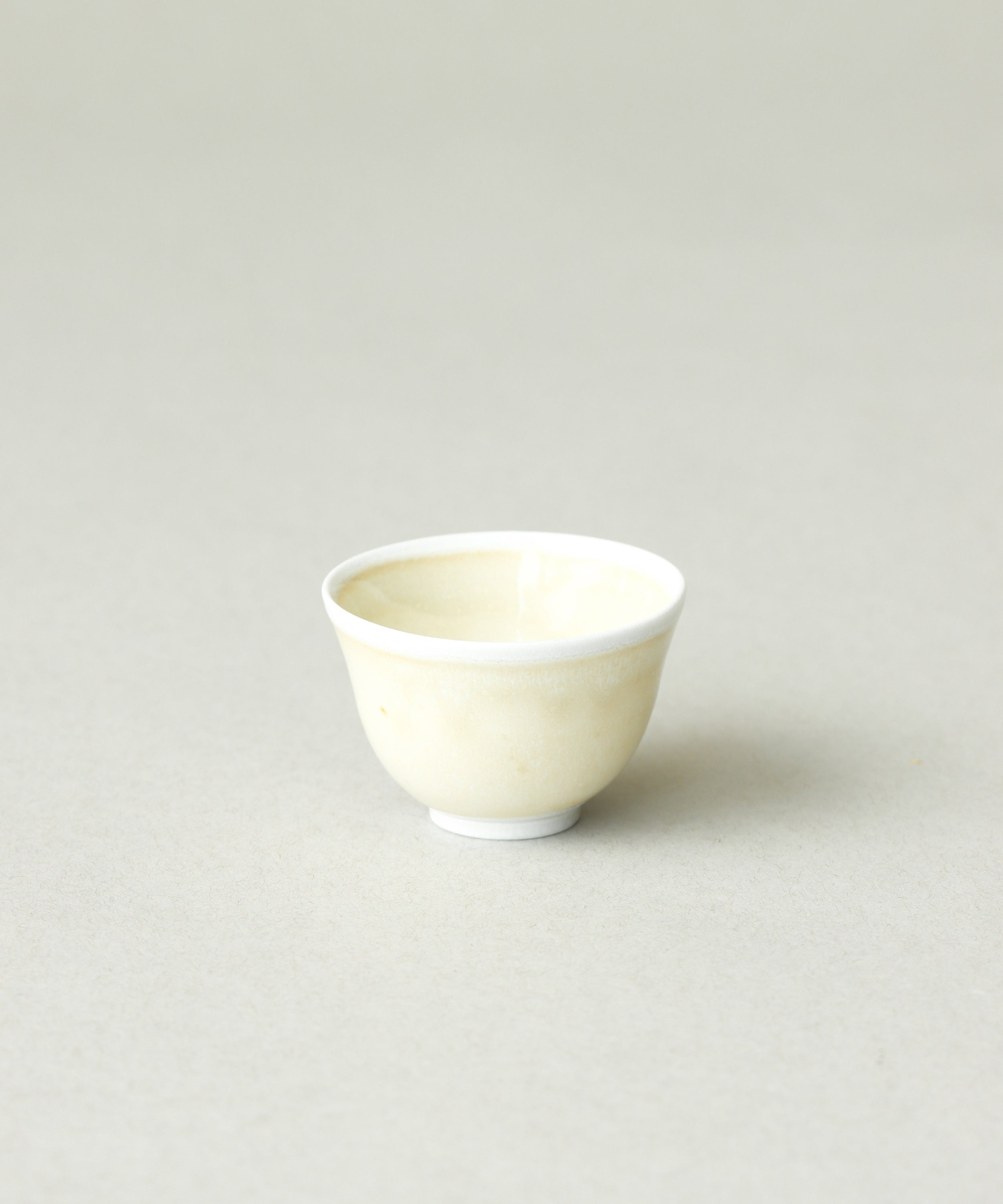 Yellow Bamboo Tea Cup interior, yellow bamboo glaze on soda-fired porcelain