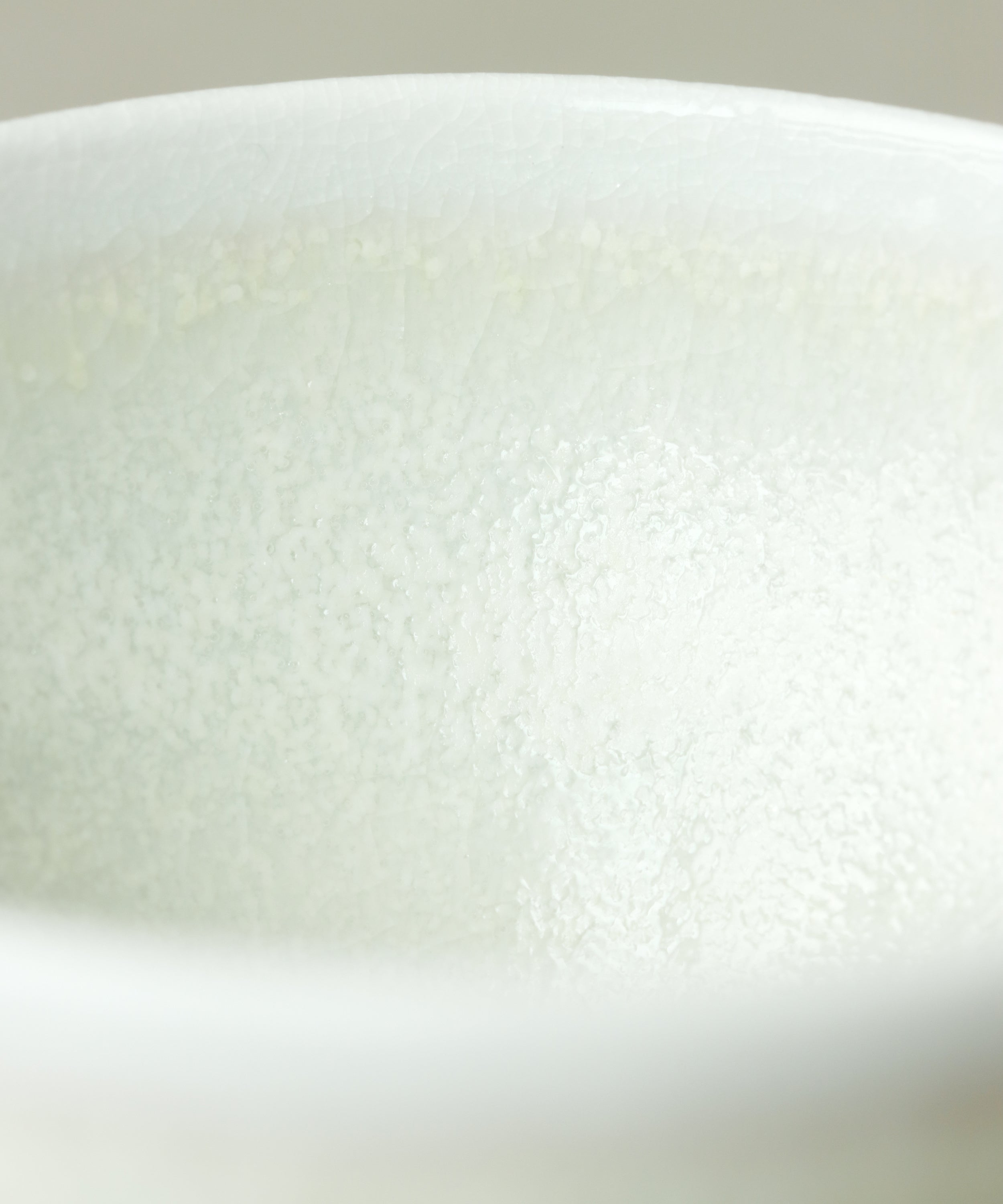 Celadon Tea Cup glaze detail, crackled celadon on soda-fired porcelain