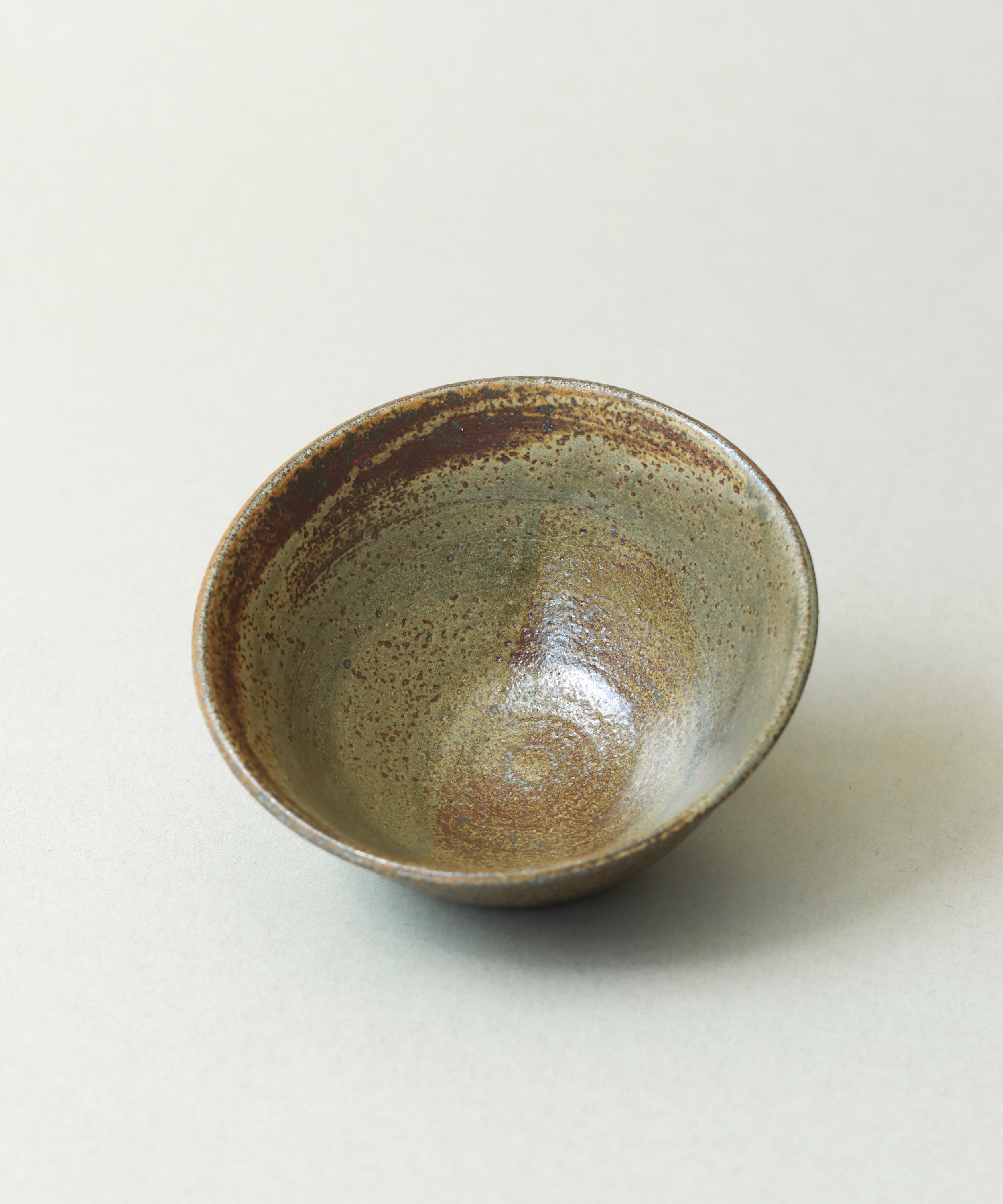 Zisha Celadon Bowl One interior, speckled green and brown celadon glaze