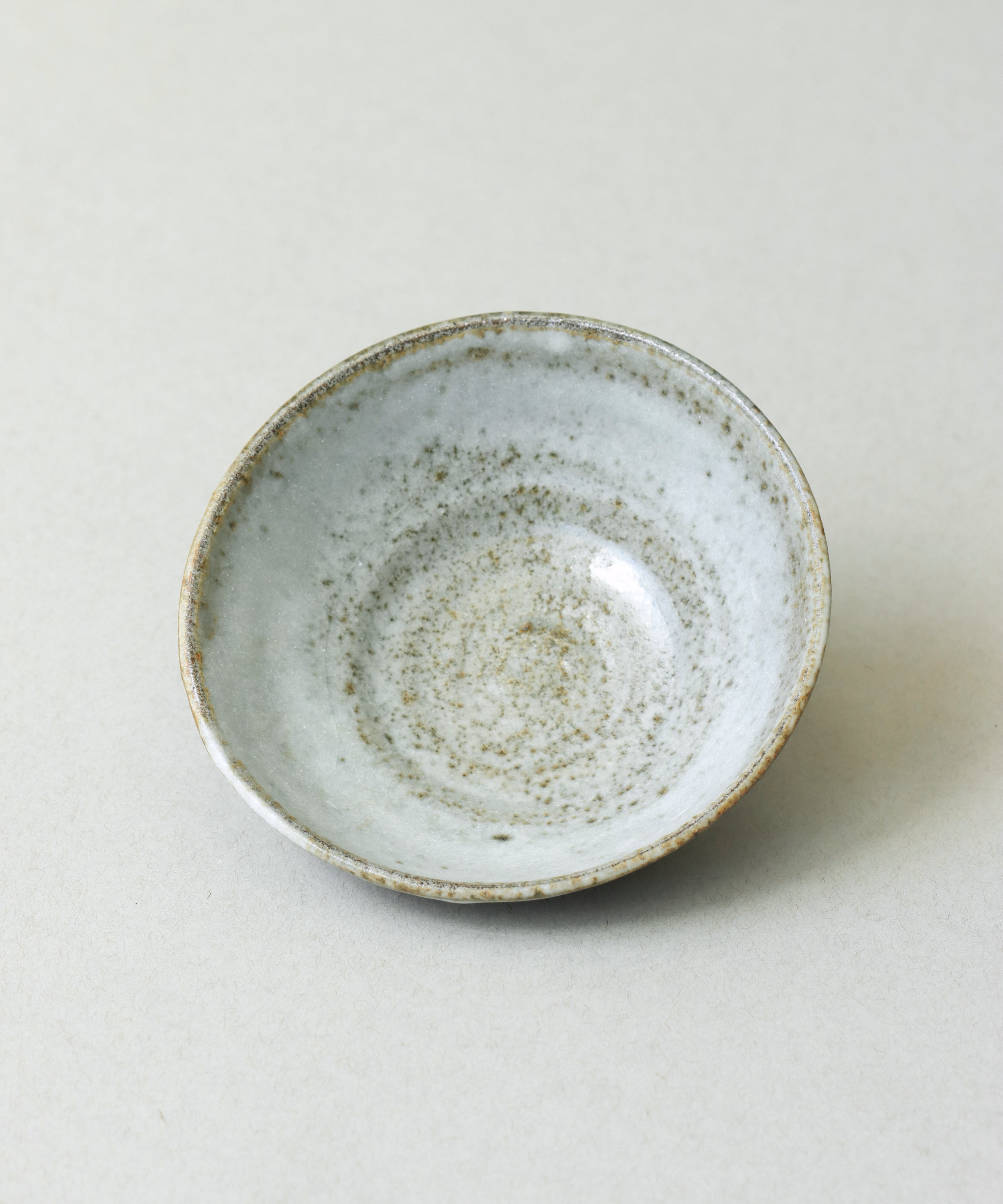 Zisha Plate One top view, grey-blue cream glaze on iron-rich Yixing clay body