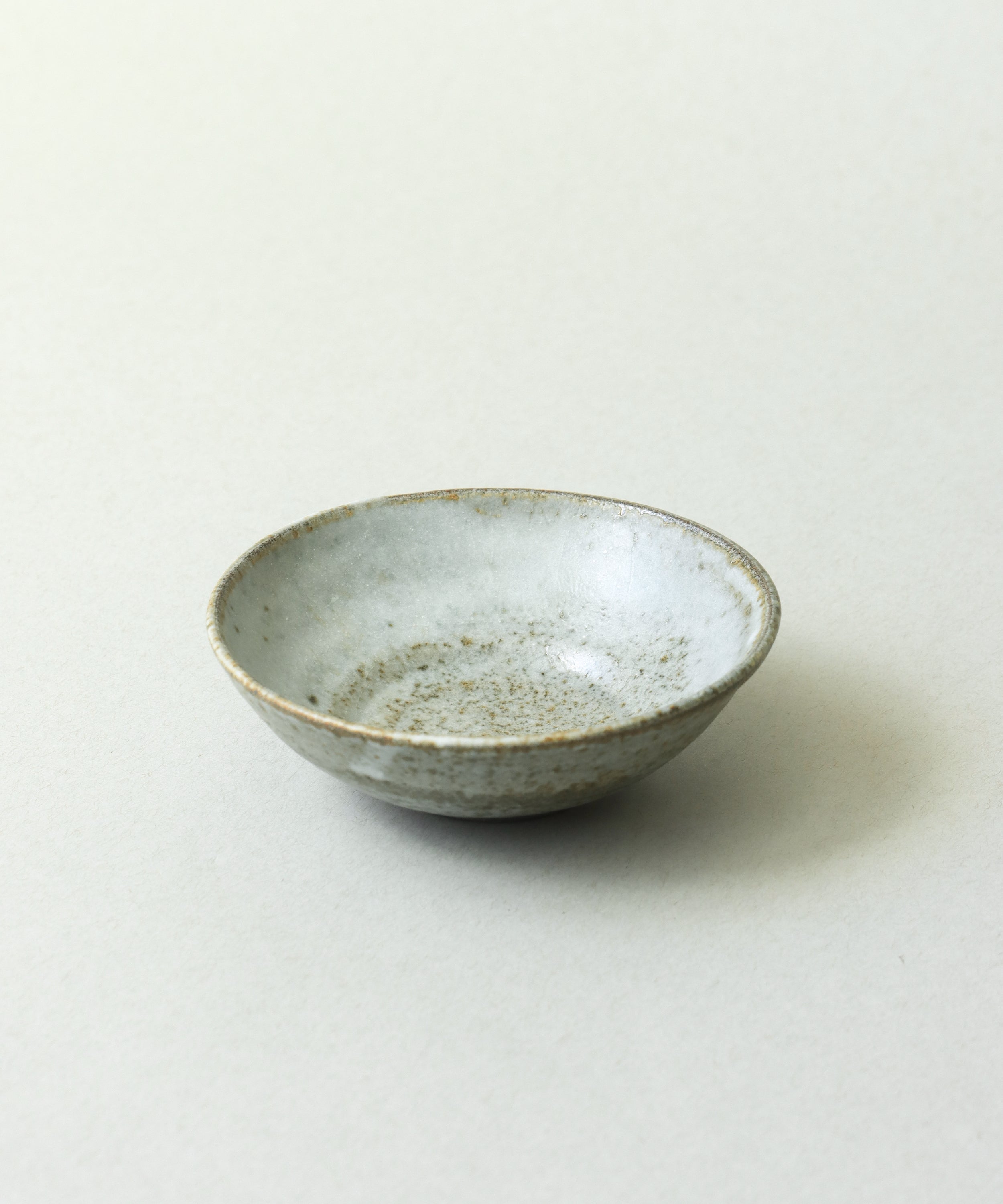 Zisha Plate One side profile, soda-fired with speckled glaze by Wei Cheng