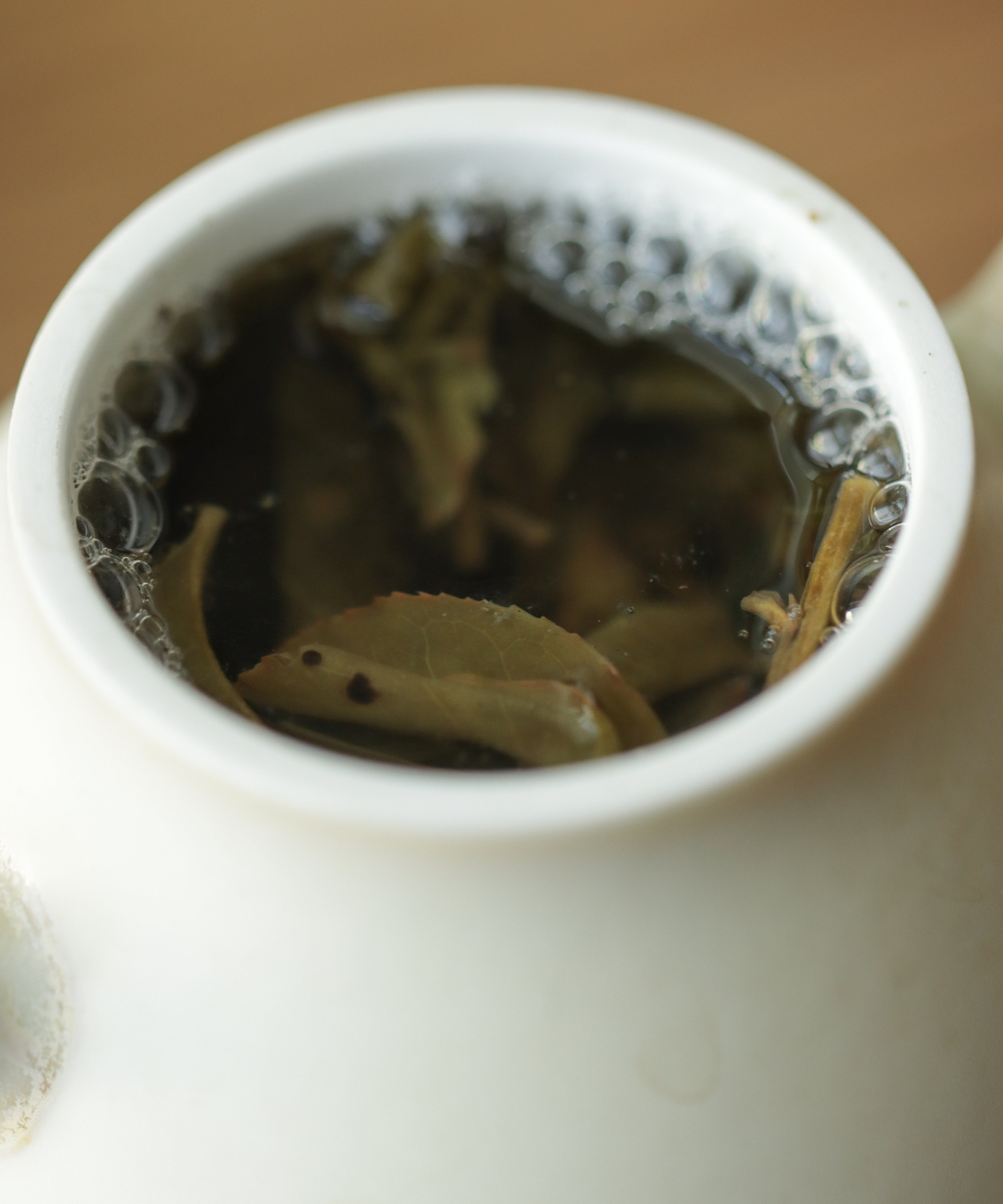 Mountains and Beyond wet leaves after brewing — old-growth sheng pu'erh, Tang Wang, Jinggu, Yunnan