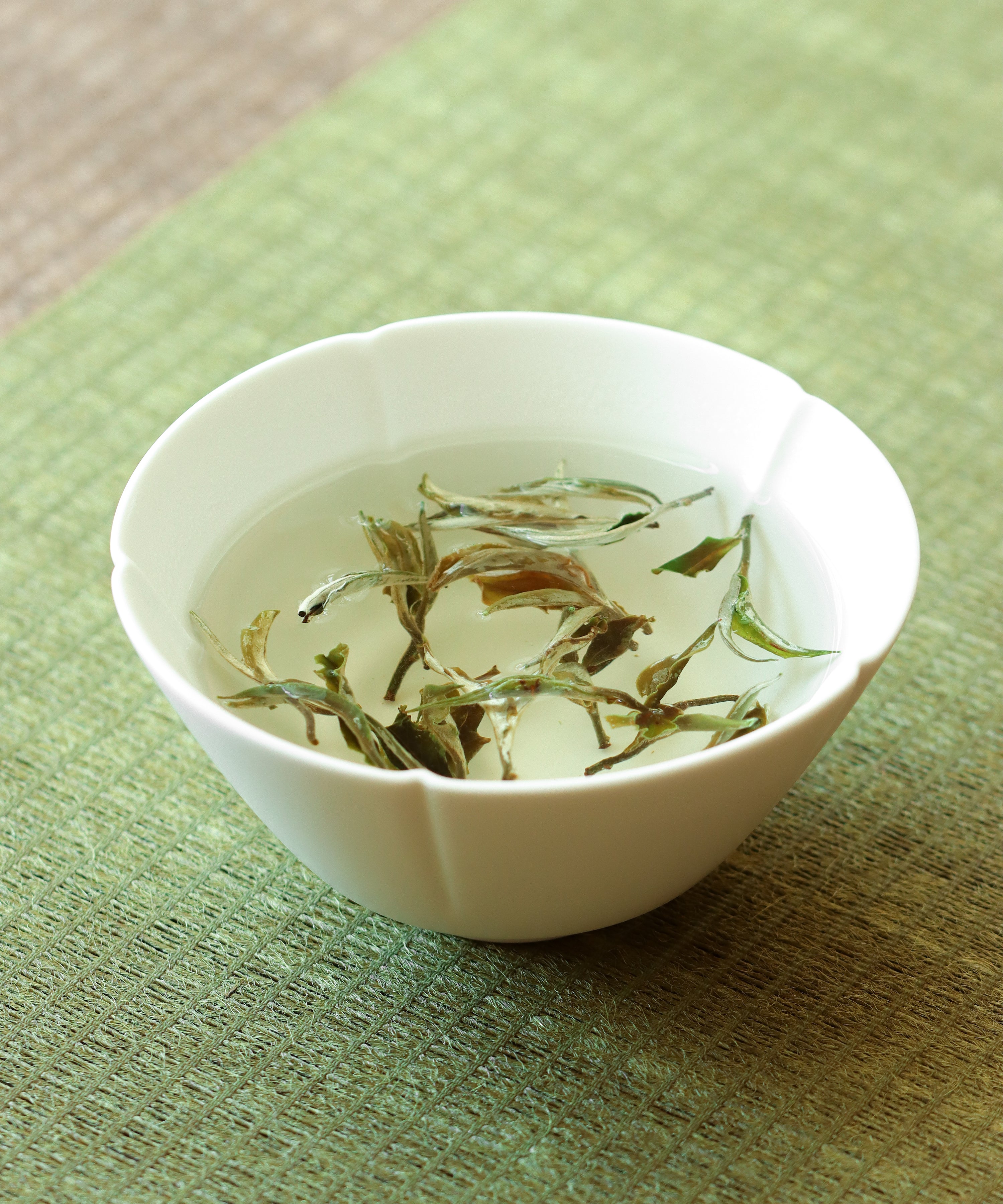 Green Peony liquor — honeysuckle, plum blossom, and fresh apricot white tea, Jinggu, Yunnan