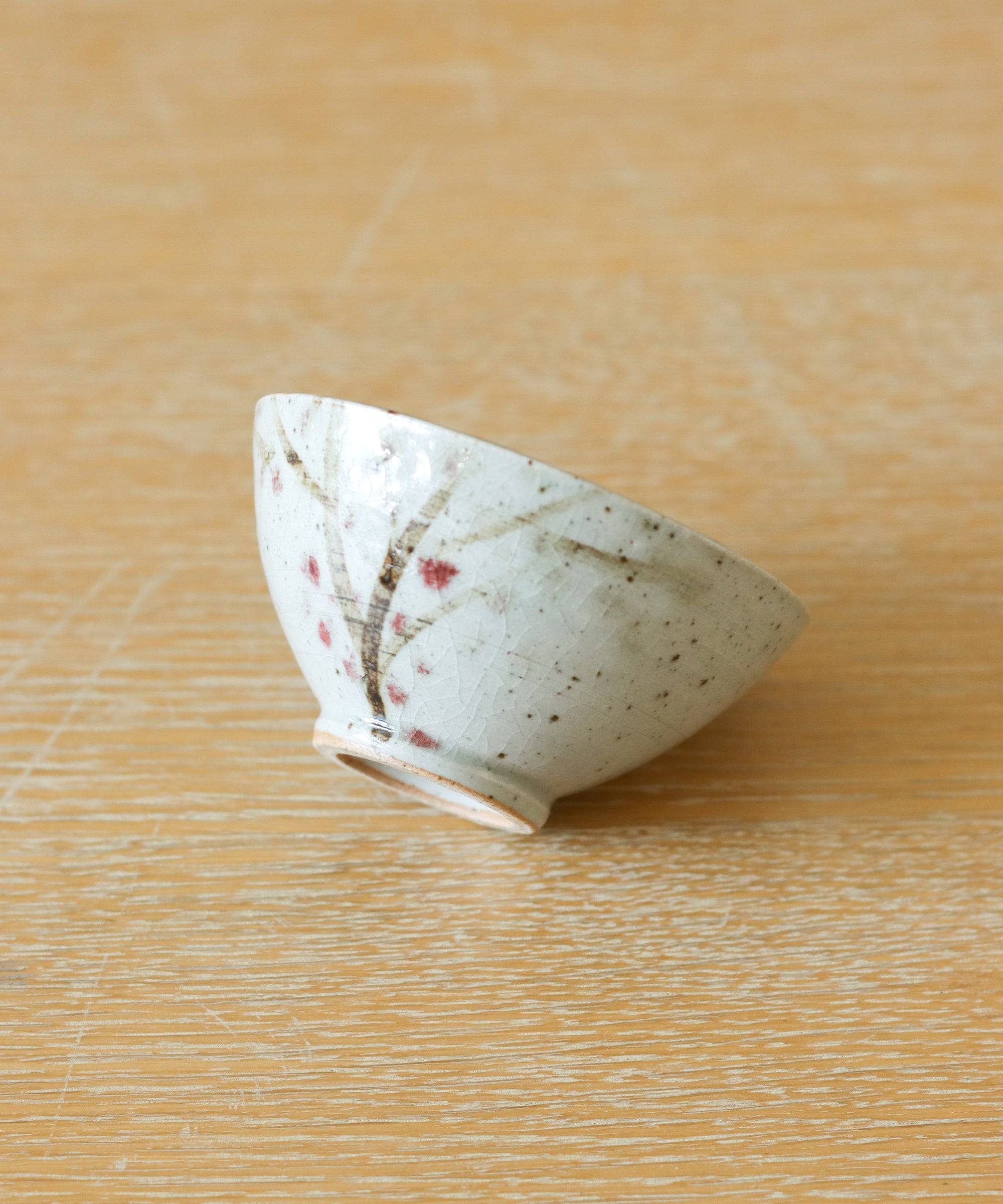 Cup No. 9 underside, gas-fired porcelain clay body by Danny Kostyshin